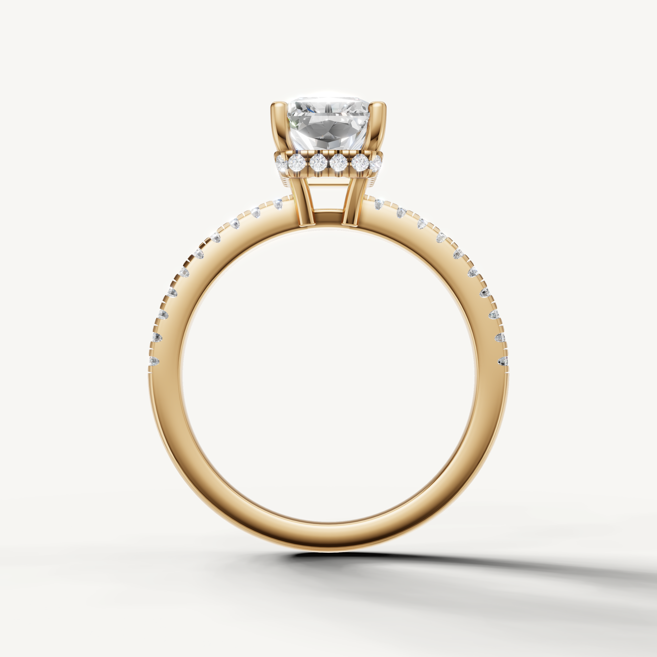 modern radiant cut lab grown diamond ring with brilliant faceting and yellow gold setting