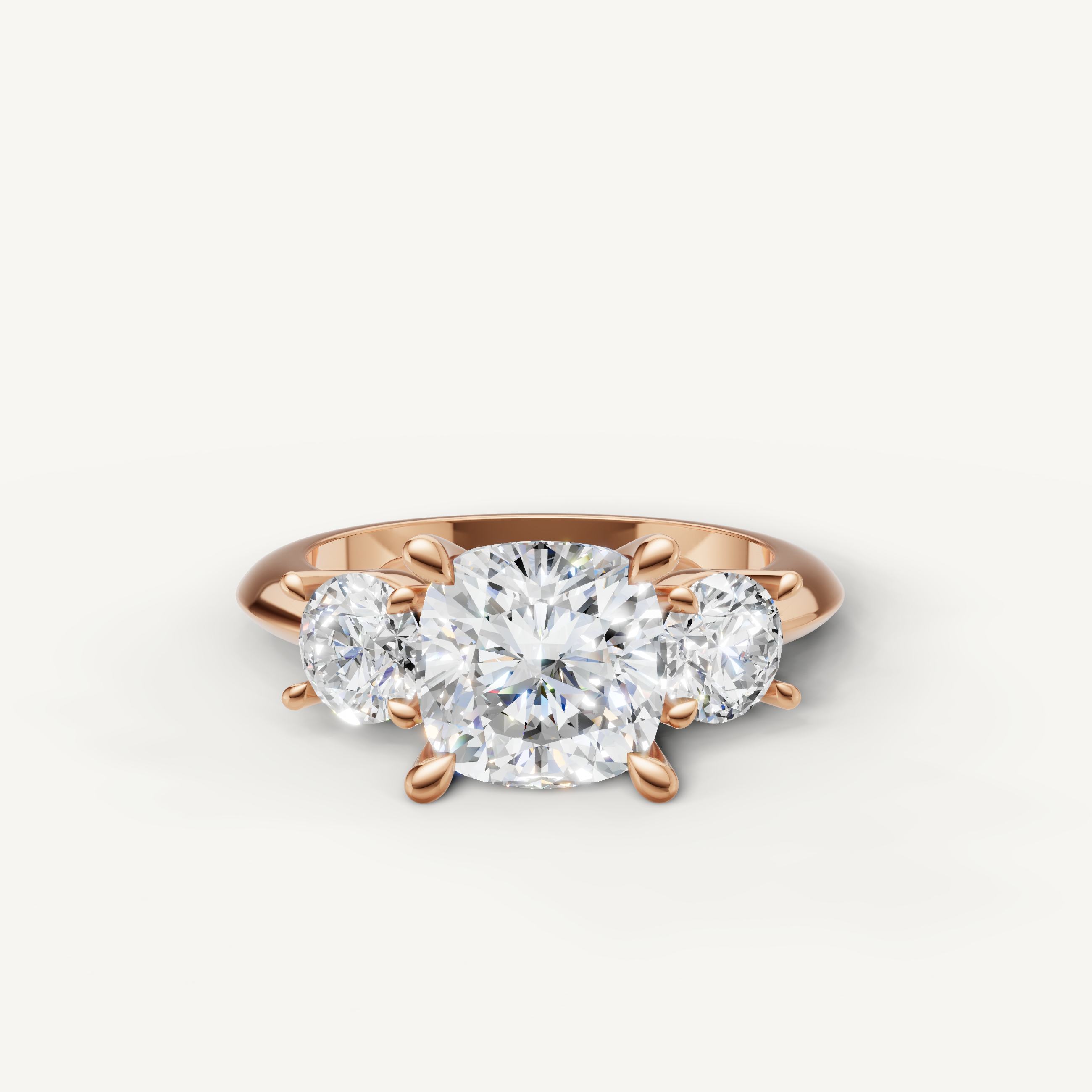 Cushion cut three stone lab grown diamond engagement ring in 14K rose gold