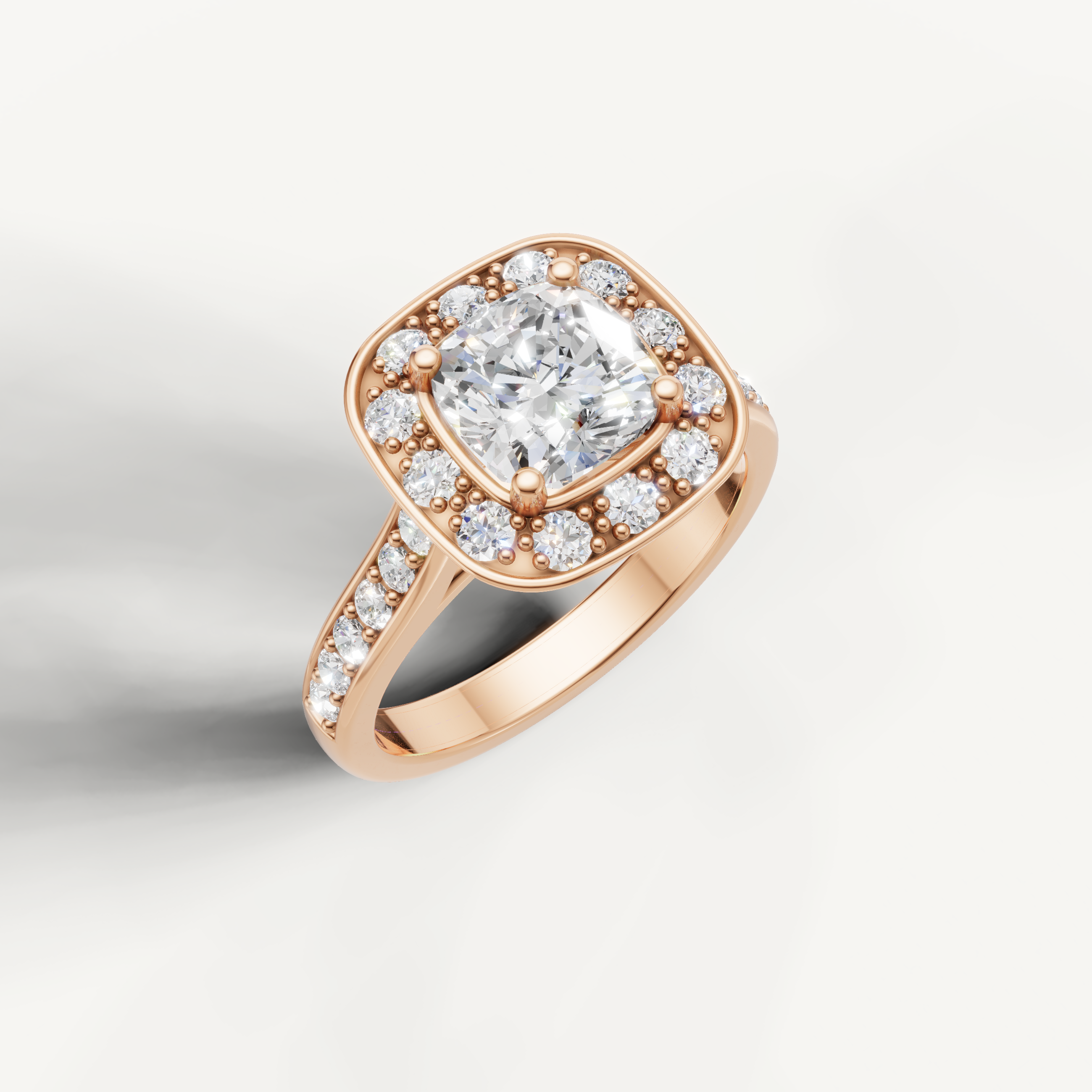 Rose gold cushion cut halo diamond ring with elegant sparkle by Raul Diamonds.