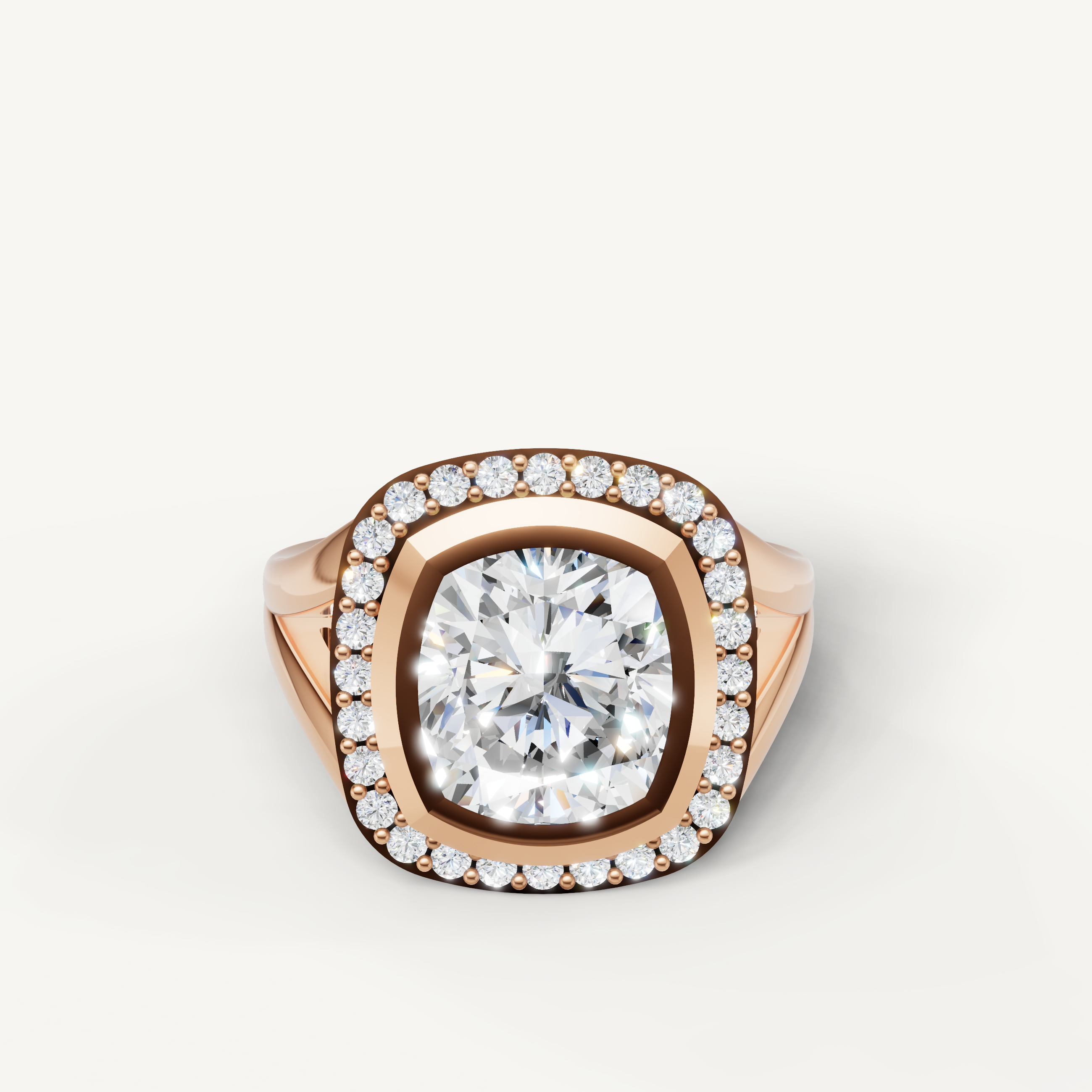 Raul Diamonds rose gold pear diamond ring with brilliant halo detailing.