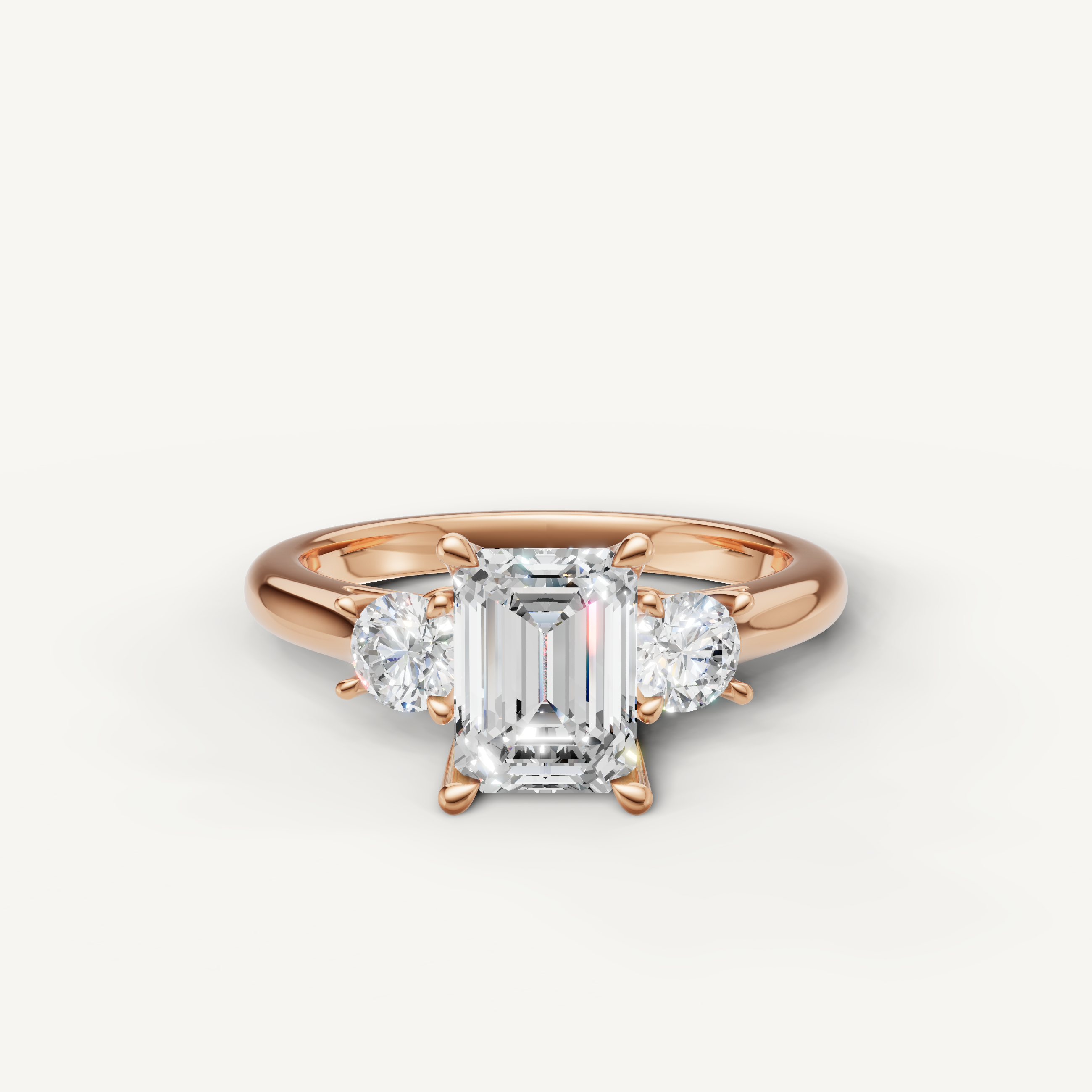 Emerald cut three stone lab grown diamond engagement ring in 14K rose gold