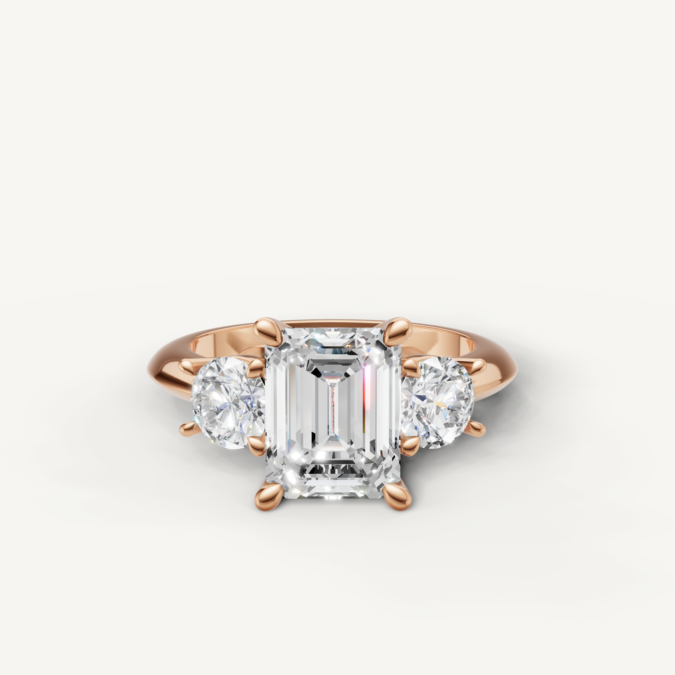 Emerald cut three stone lab grown diamond engagement ring in 14K rose gold