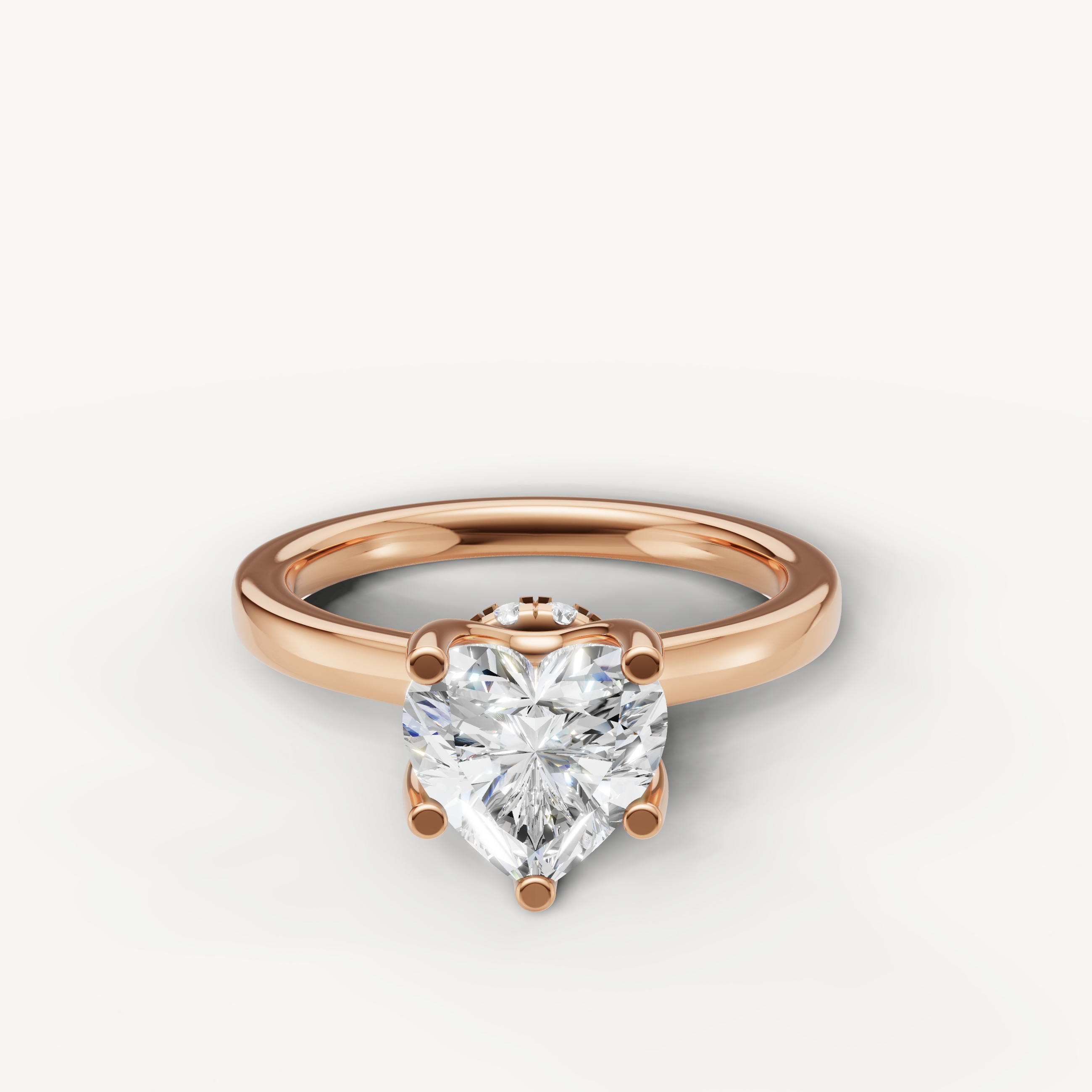 heart shaped lab grown diamond solitaire engagement ring in 14k rose gold with hidden halo