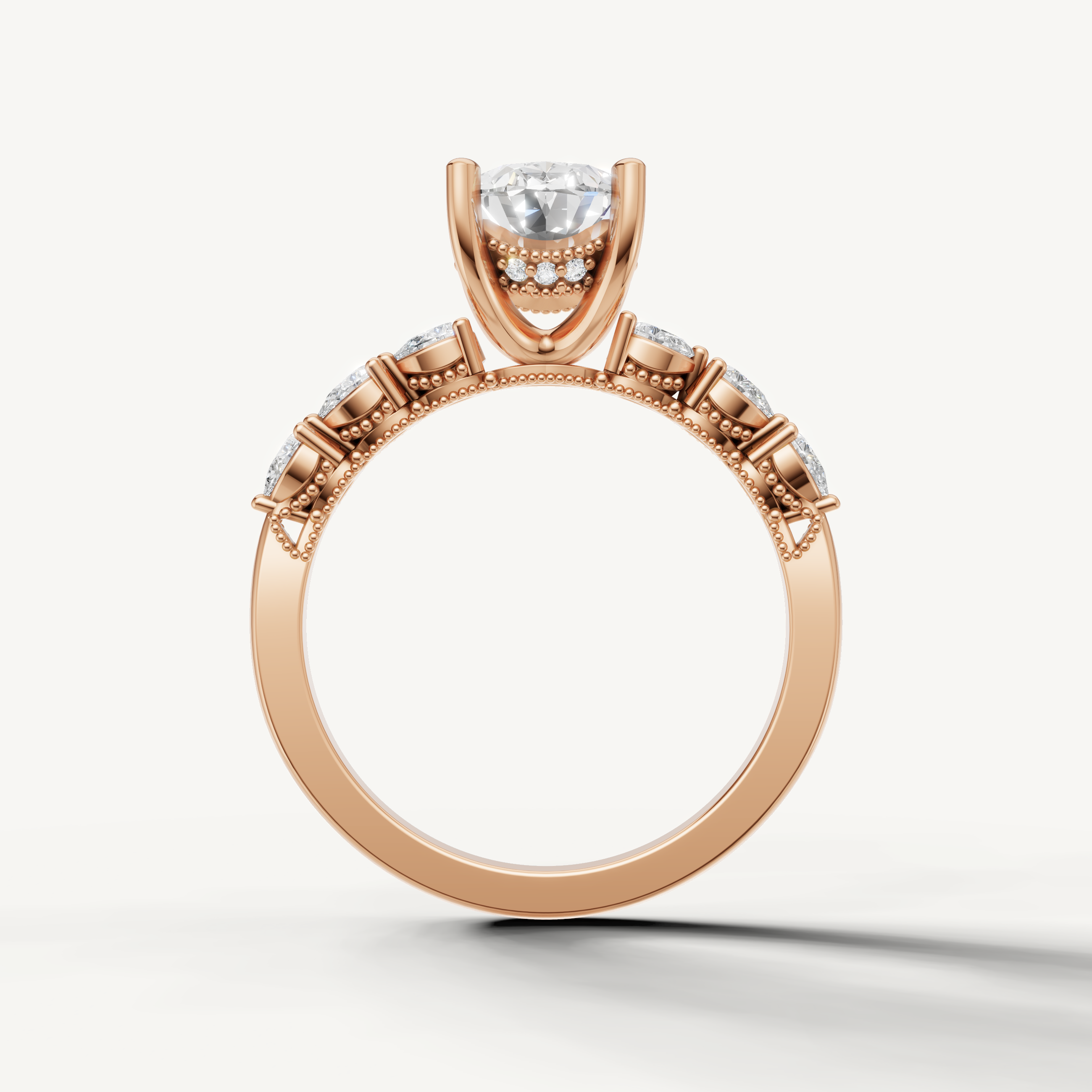 Oval cut lab grown diamond solitaire ring in rose gold with marquise accent diamonds by Raul Diamonds