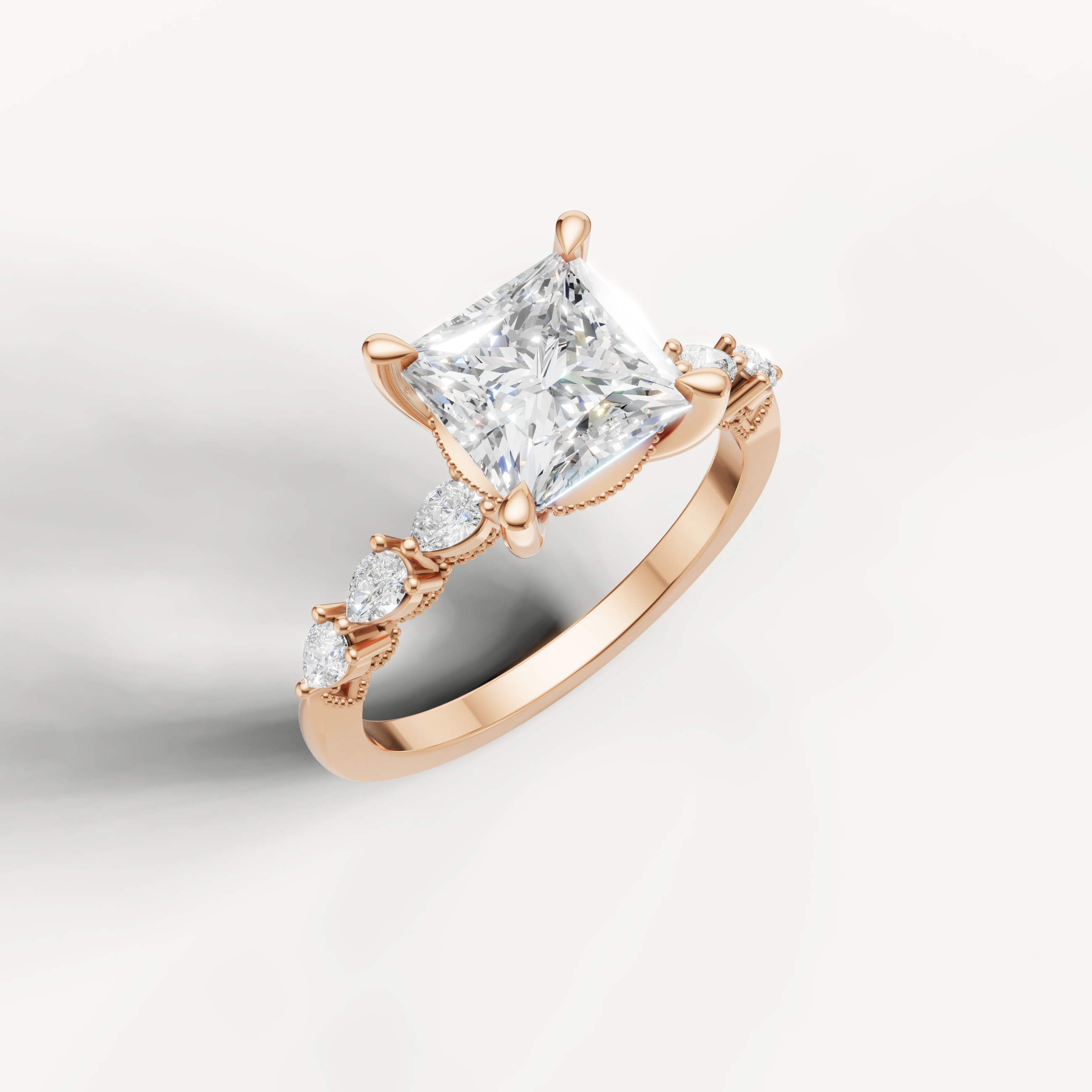 Rose gold princess cut lab grown diamond ring with marquise diamond accents and elegant nature inspired setting