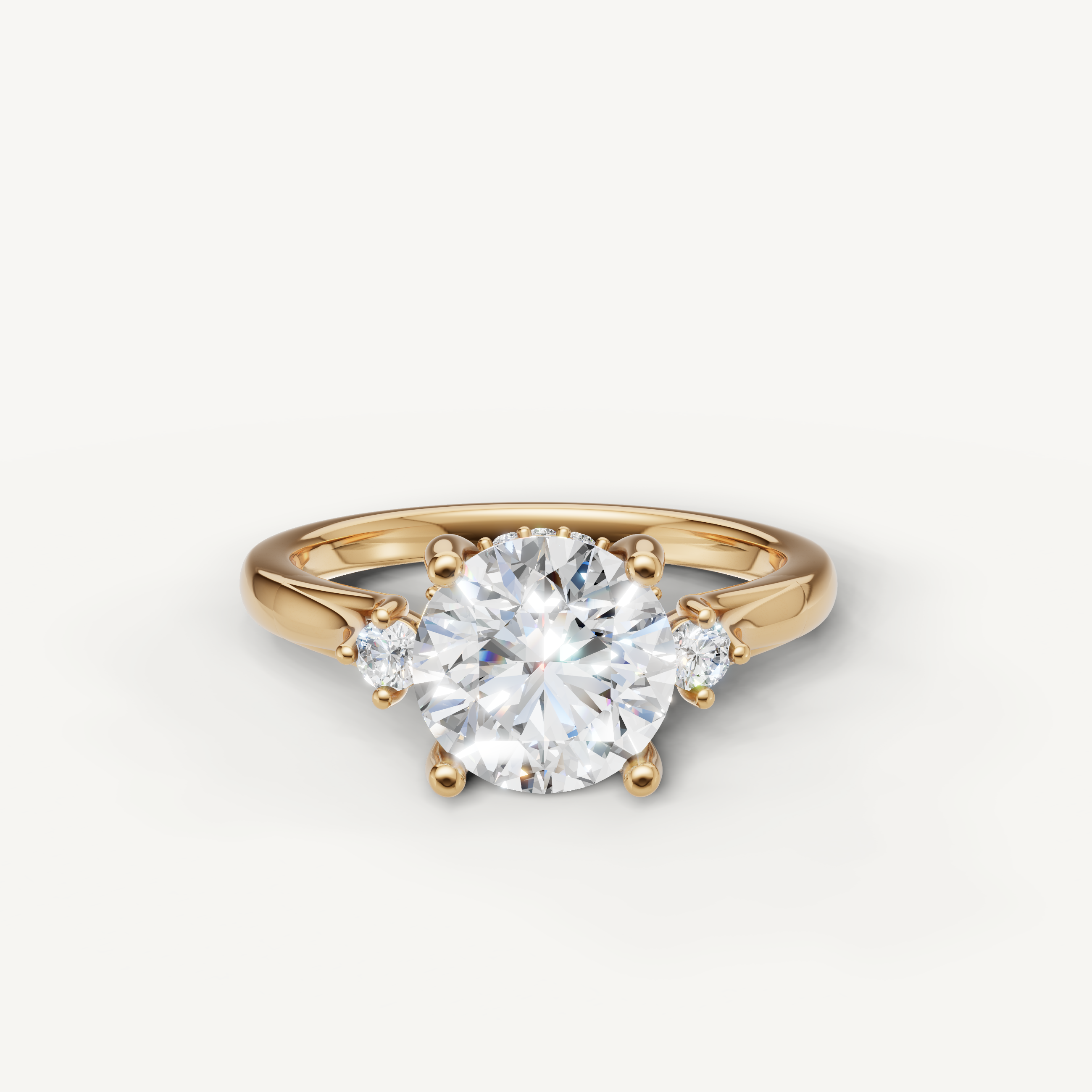 Round cut lab grown diamond engagement ring in 14K yellow gold with round side stones by Raul Diamonds