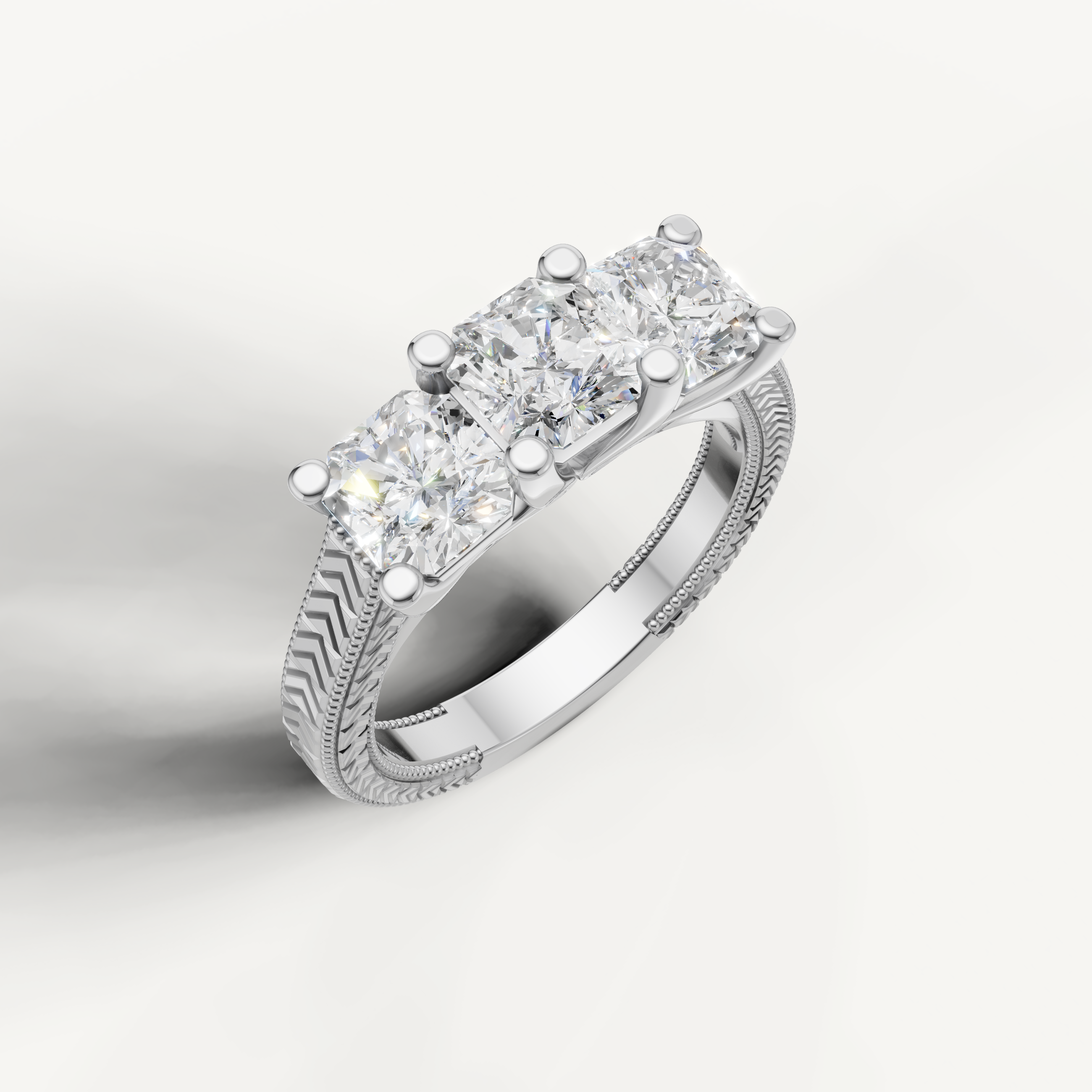 Classic white gold round cut diamond ring with three brilliant stones.
