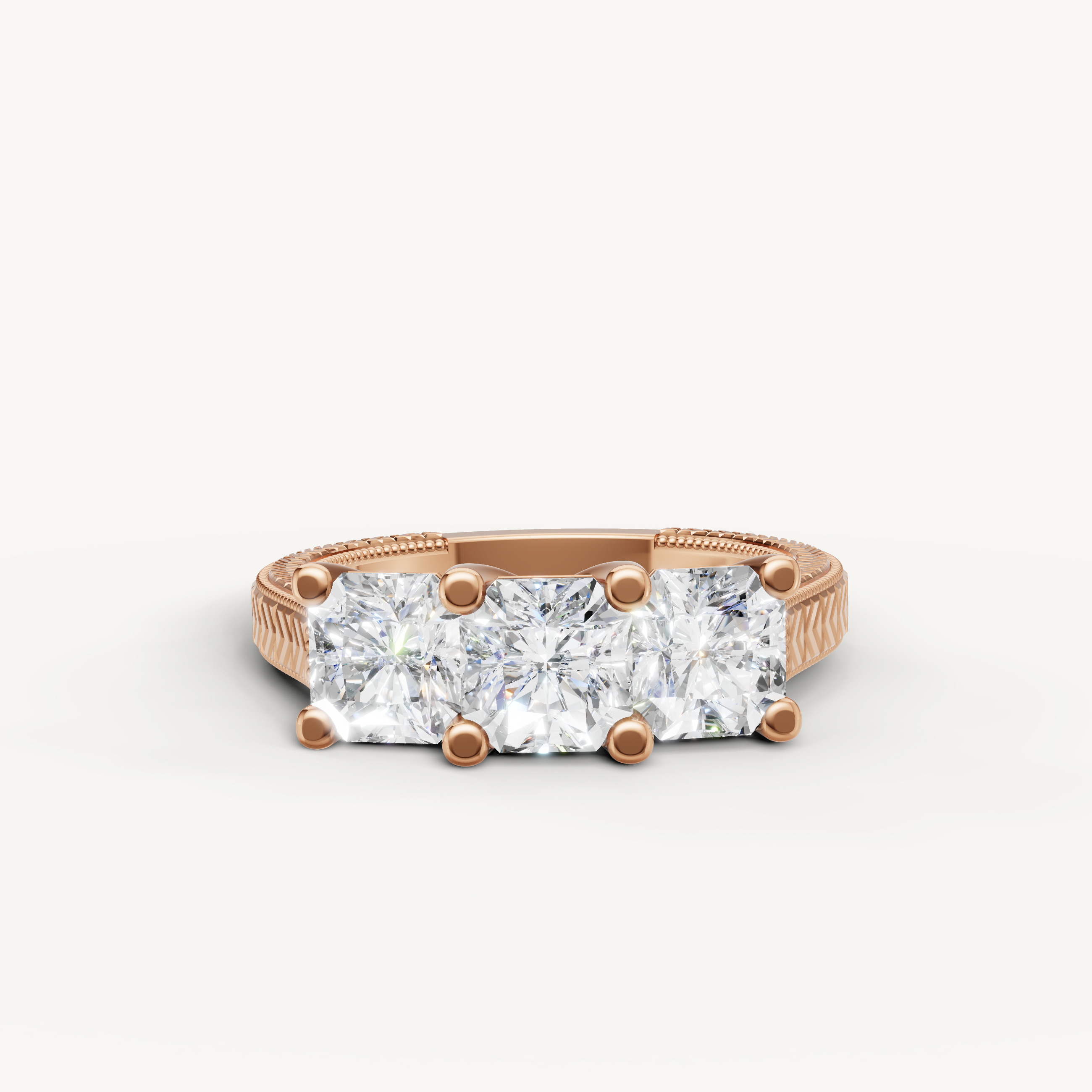 Rose gold three stone round diamond engagement ring by Raul Diamonds.