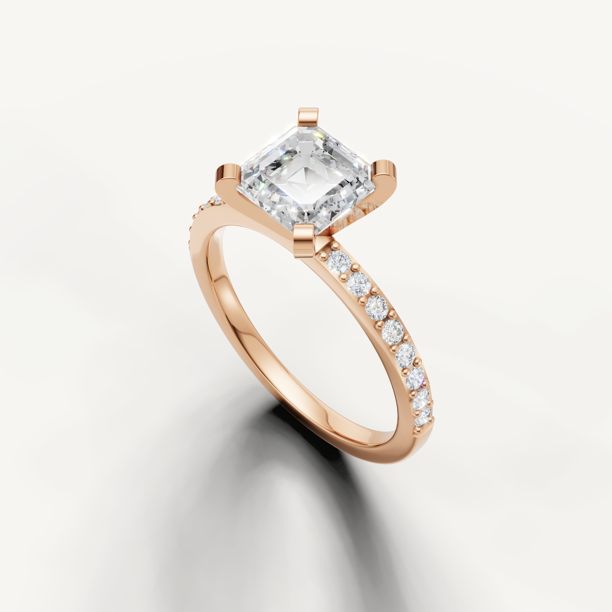 Asscher cut diamond ring in rose gold with thin pavé band