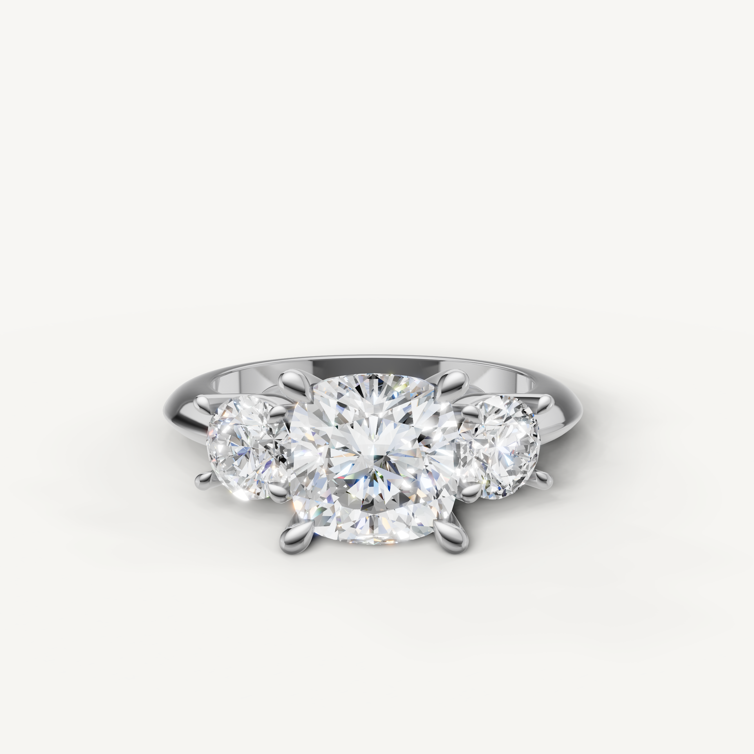 Cushion cut three stone lab grown diamond engagement ring in 14K white gold