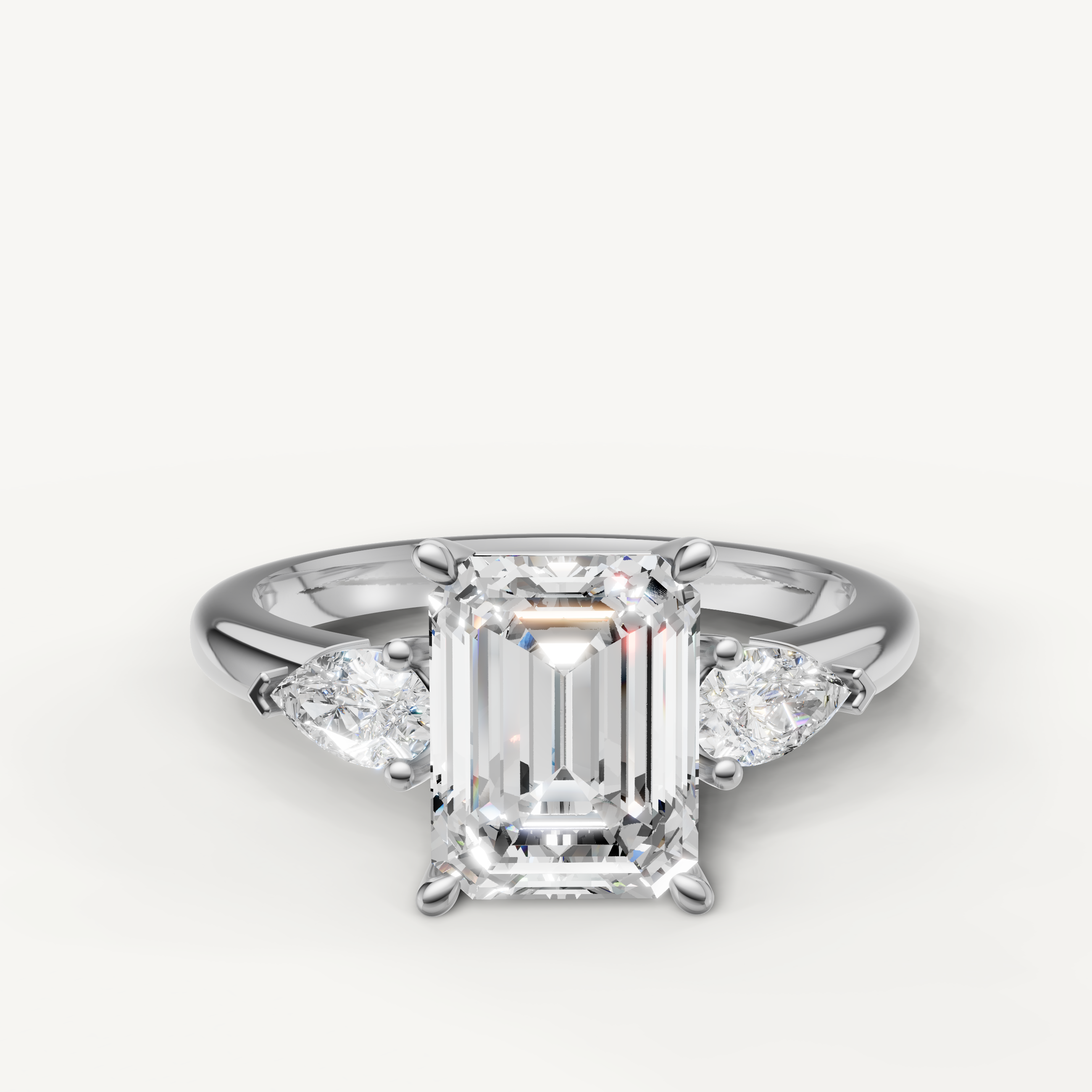 emerald cut lab grown diamond engagement ring with marquise side stones white gold