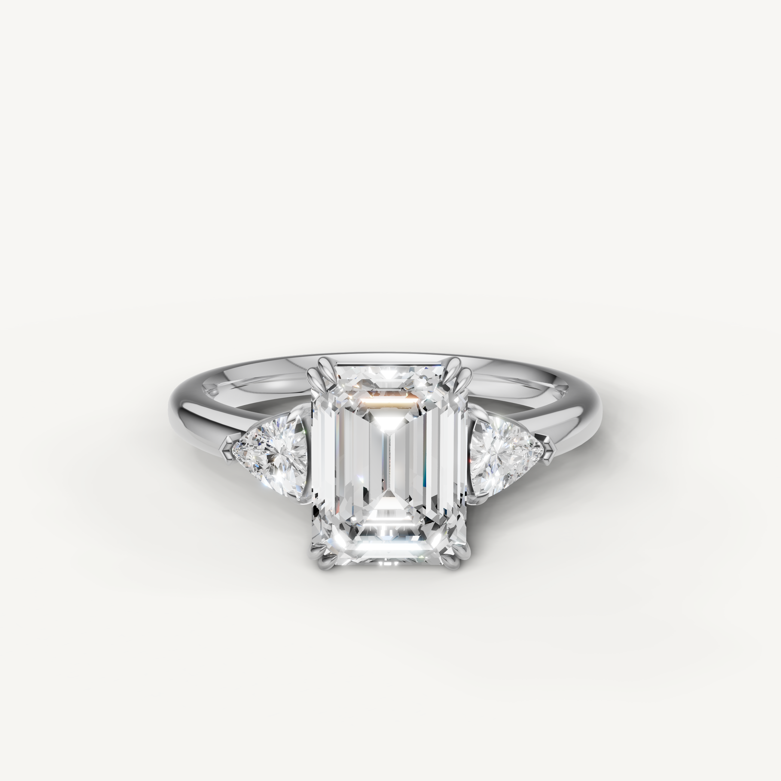 emerald cut lab grown diamond engagement ring with trillion side stones in 14k white gold