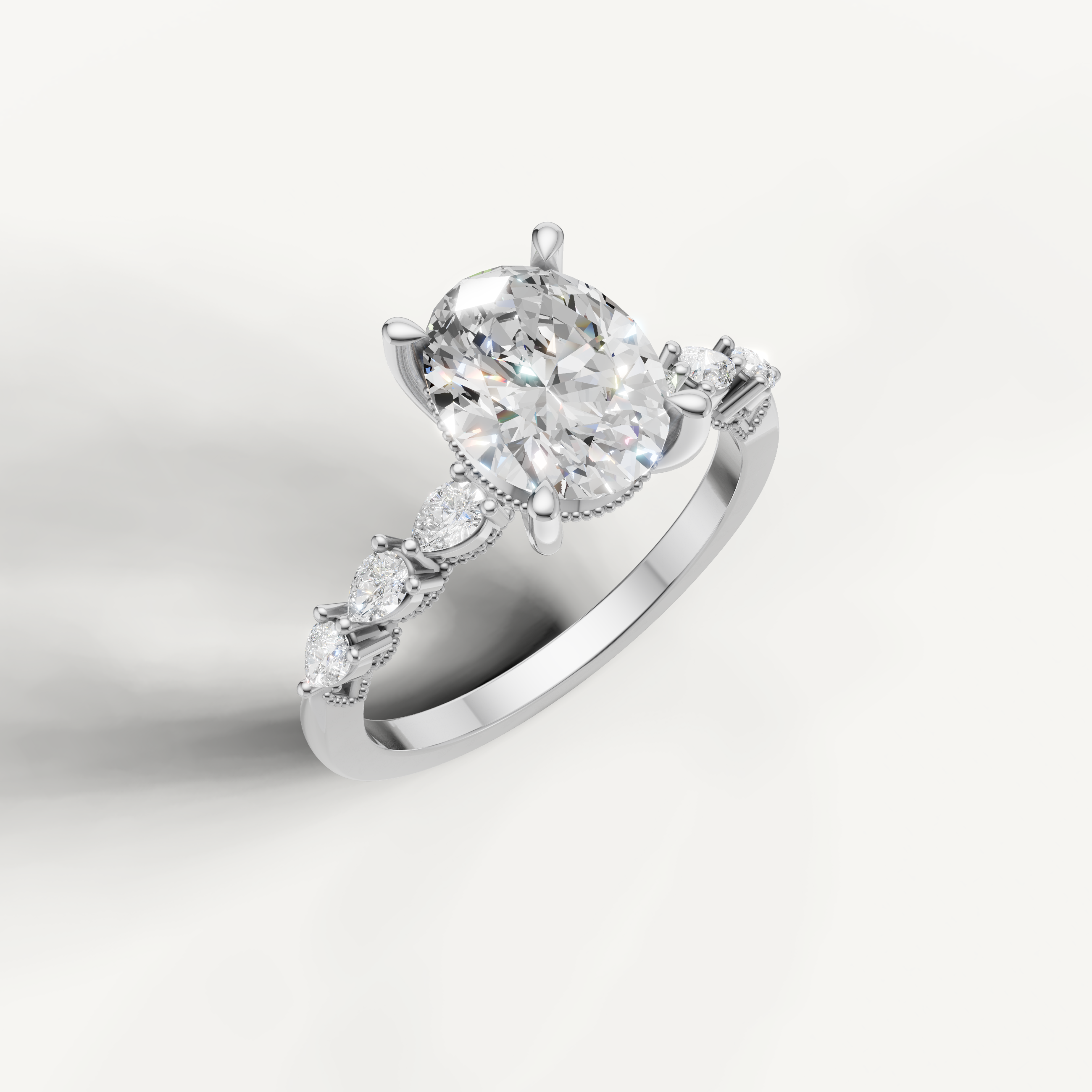 White gold oval lab grown diamond ring with marquise diamond accents and elegant nature inspired setting