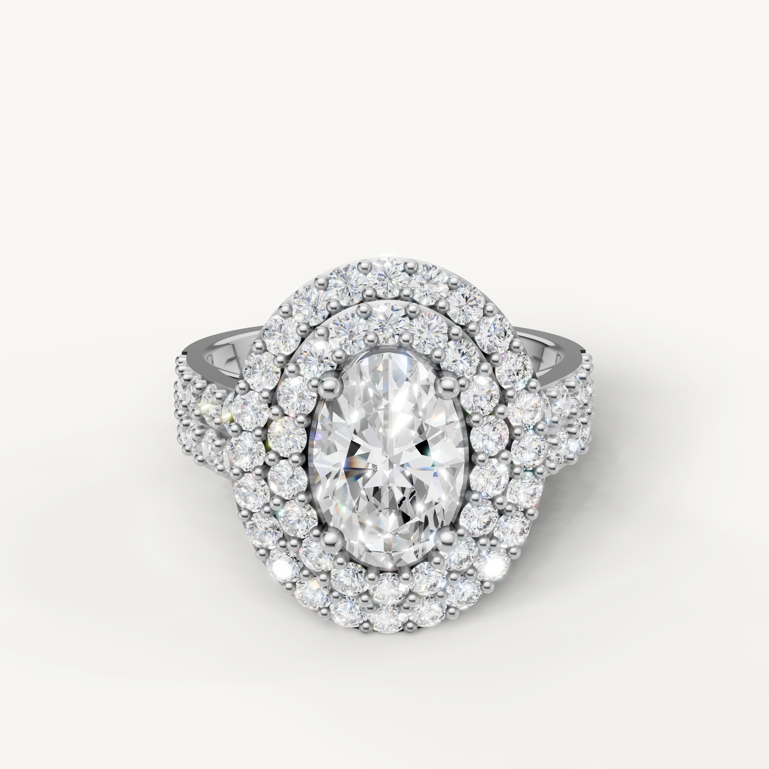 Raul Diamonds white gold oval cut engagement ring with brilliant halo diamonds