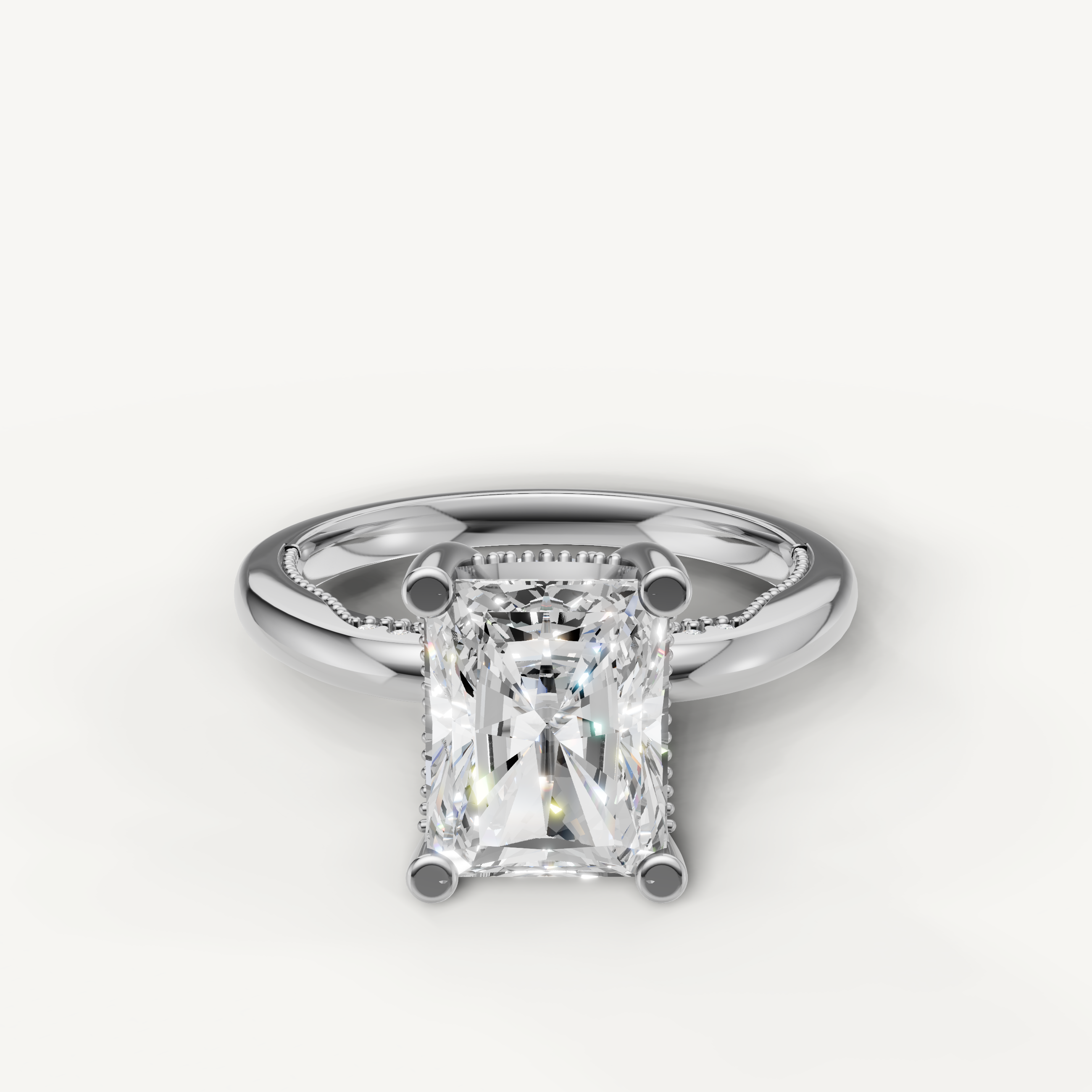 A classic solitaire engagement ring in bright, polished white gold or platinum, featuring a dazzling, high-clarity oval-cut diamond.