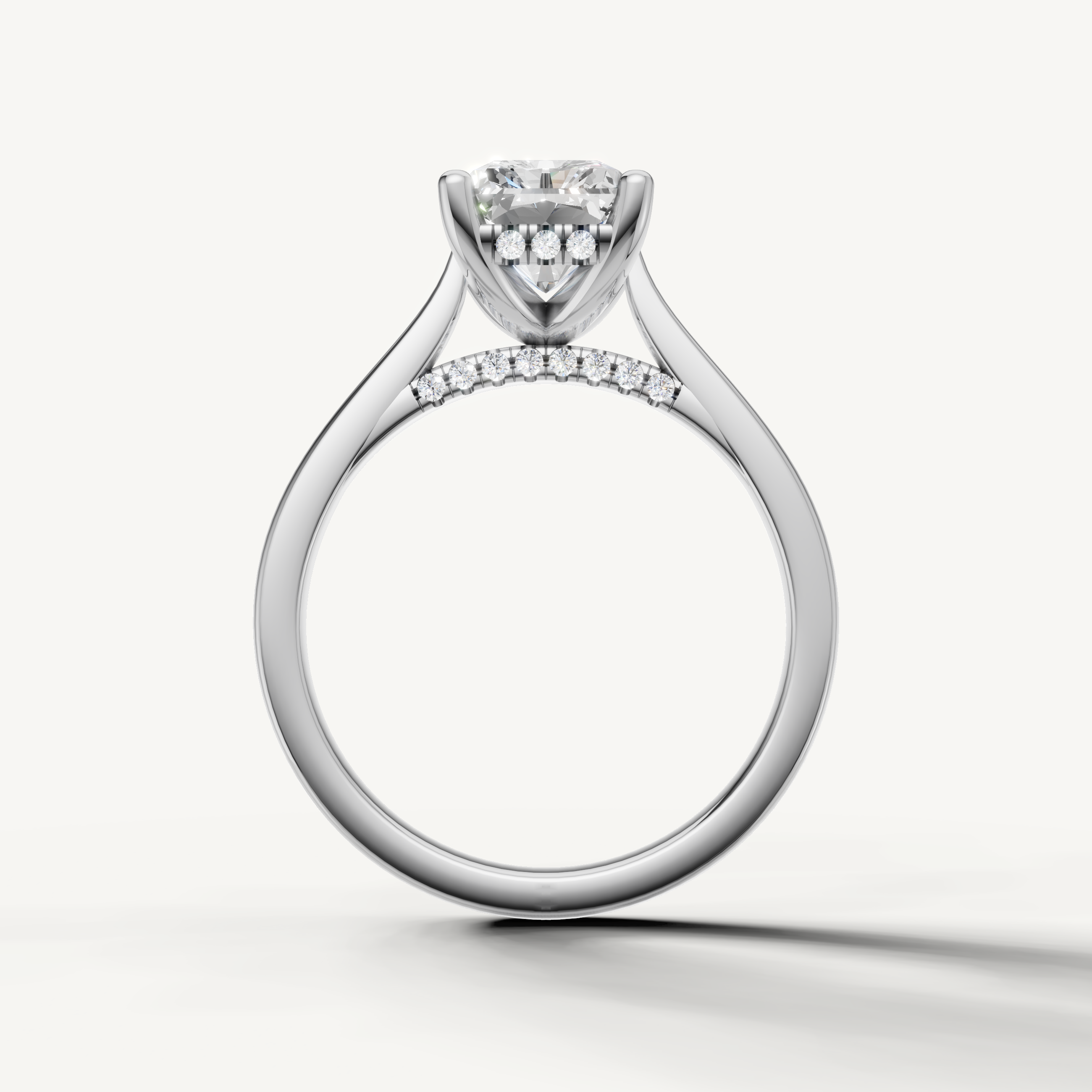Elegant white gold radiant-cut lab-grown diamond ring with hidden halo and pavé accents by Raul Diamonds