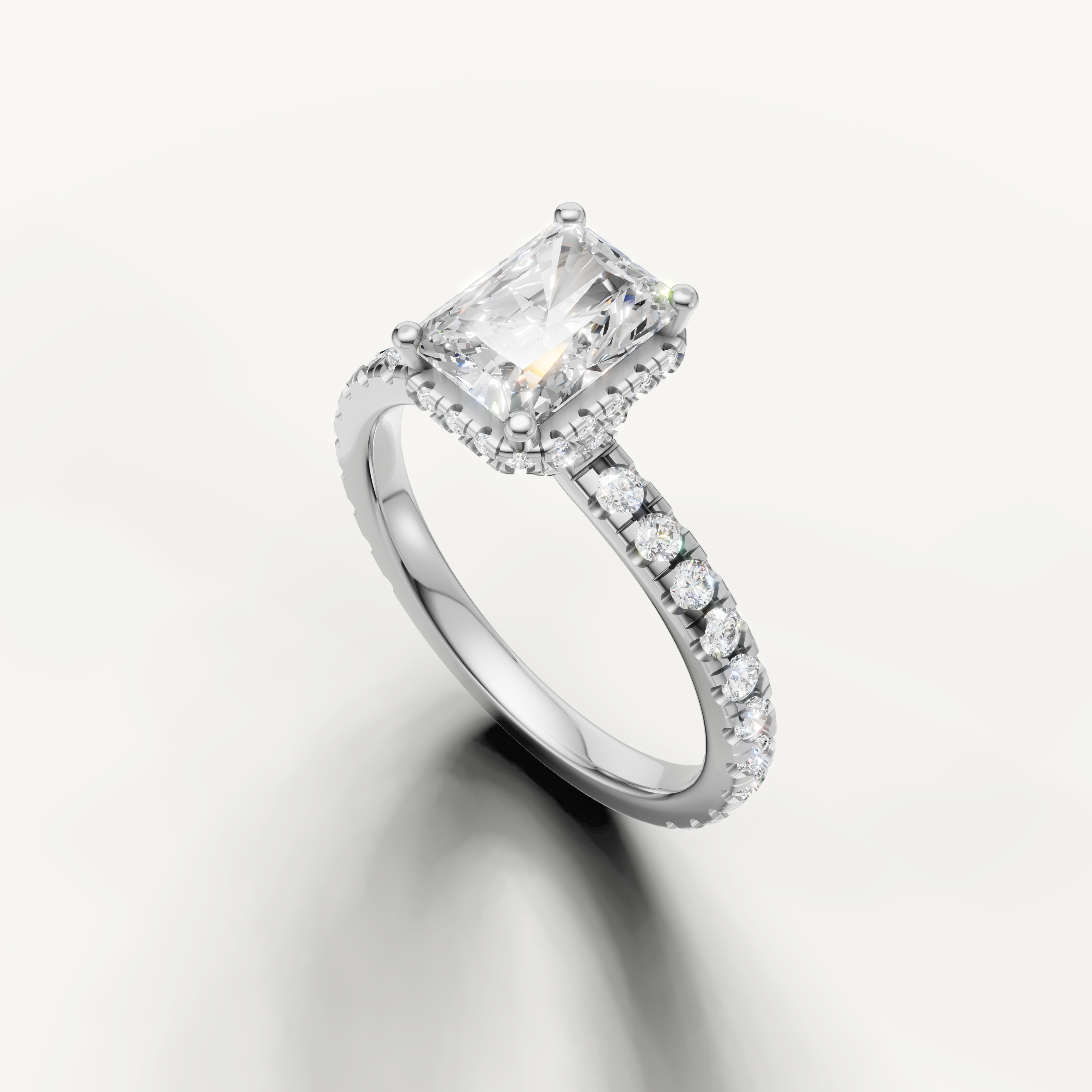 14k white gold radiant cut lab grown diamond engagement ring featuring hidden halo sparkle and delicate pavé band