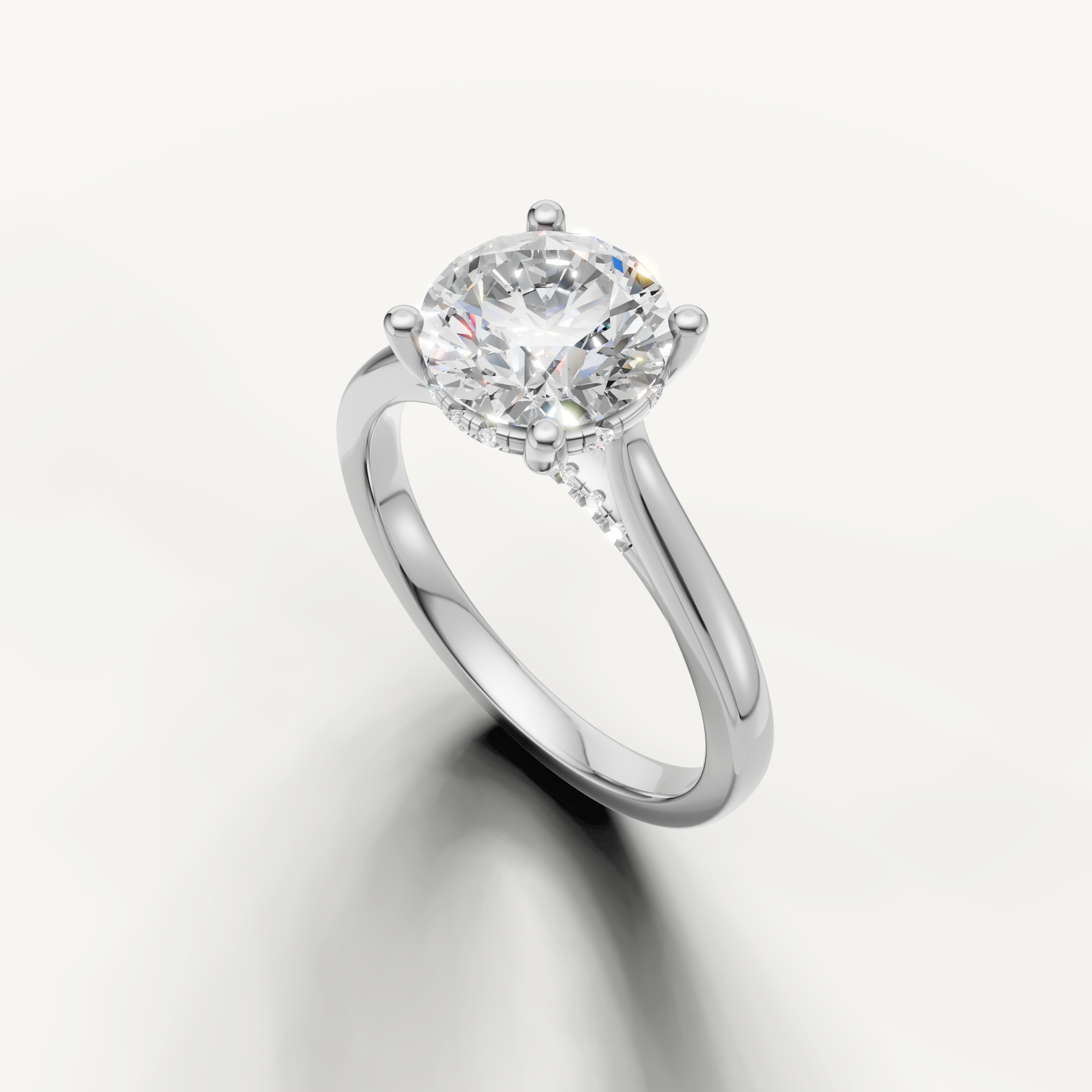 Side profile white gold round brilliant lab diamond engagement ring with hidden halo