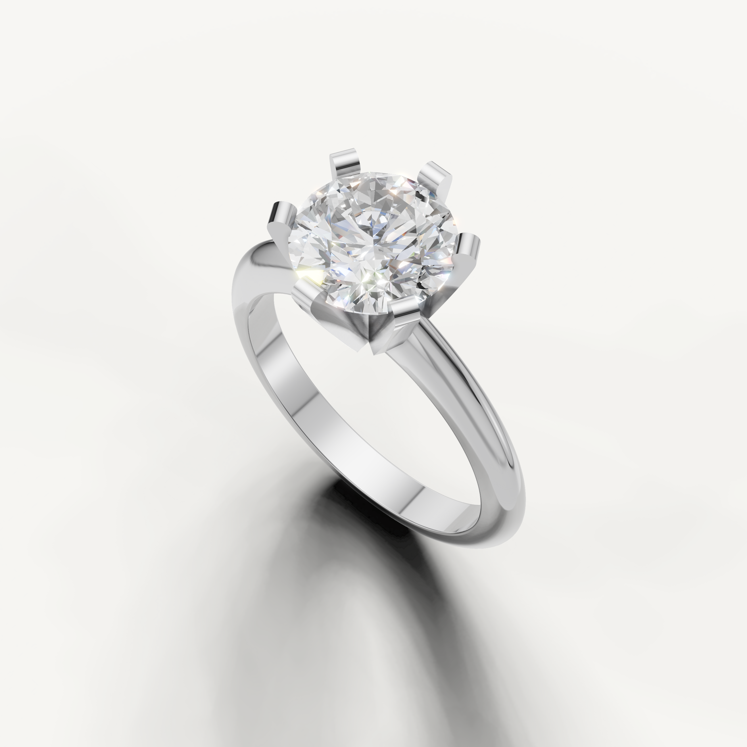 Raul Diamonds white gold solitaire ring featuring premium round diamond.