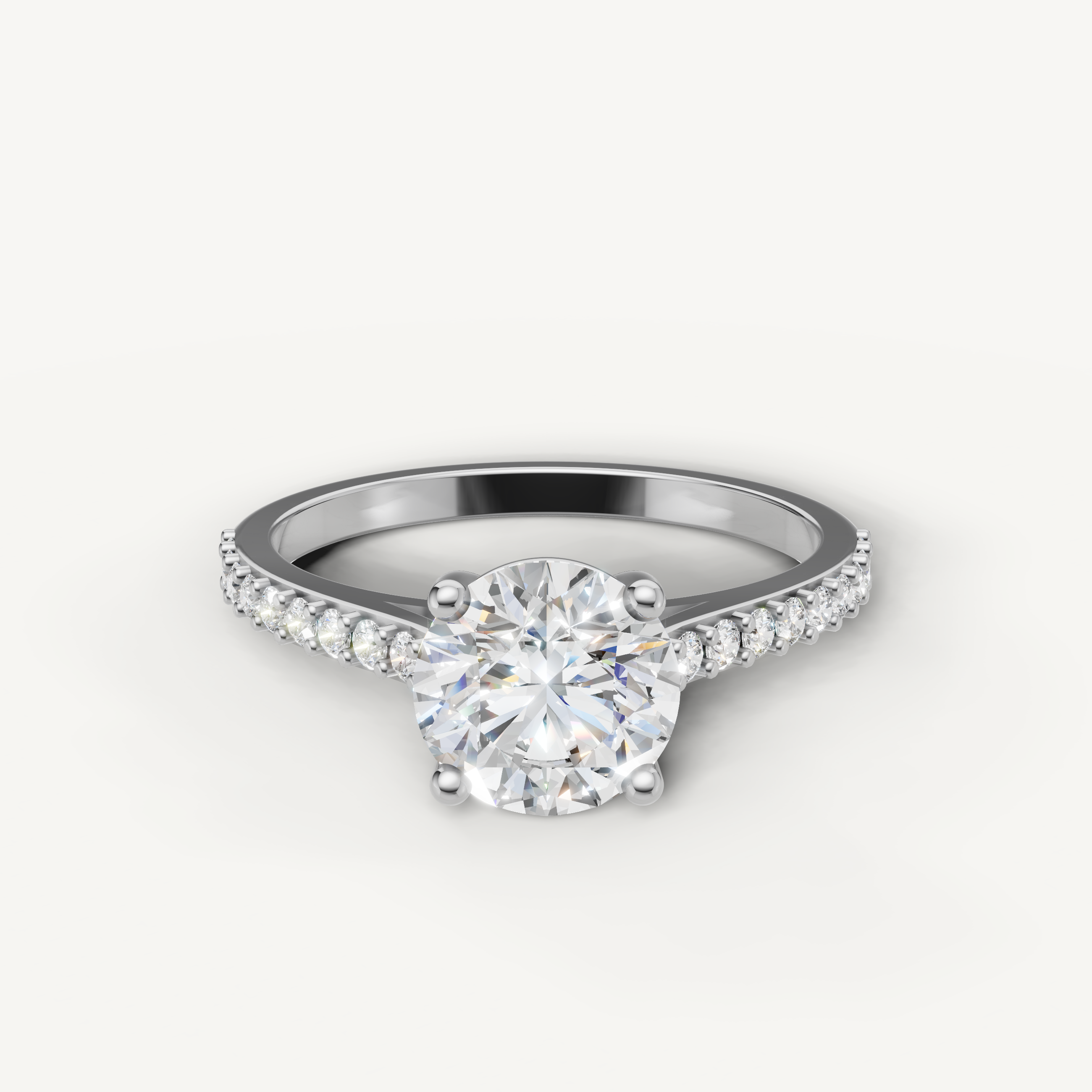 White gold round solitaire diamond engagement ring by Raul Diamonds.