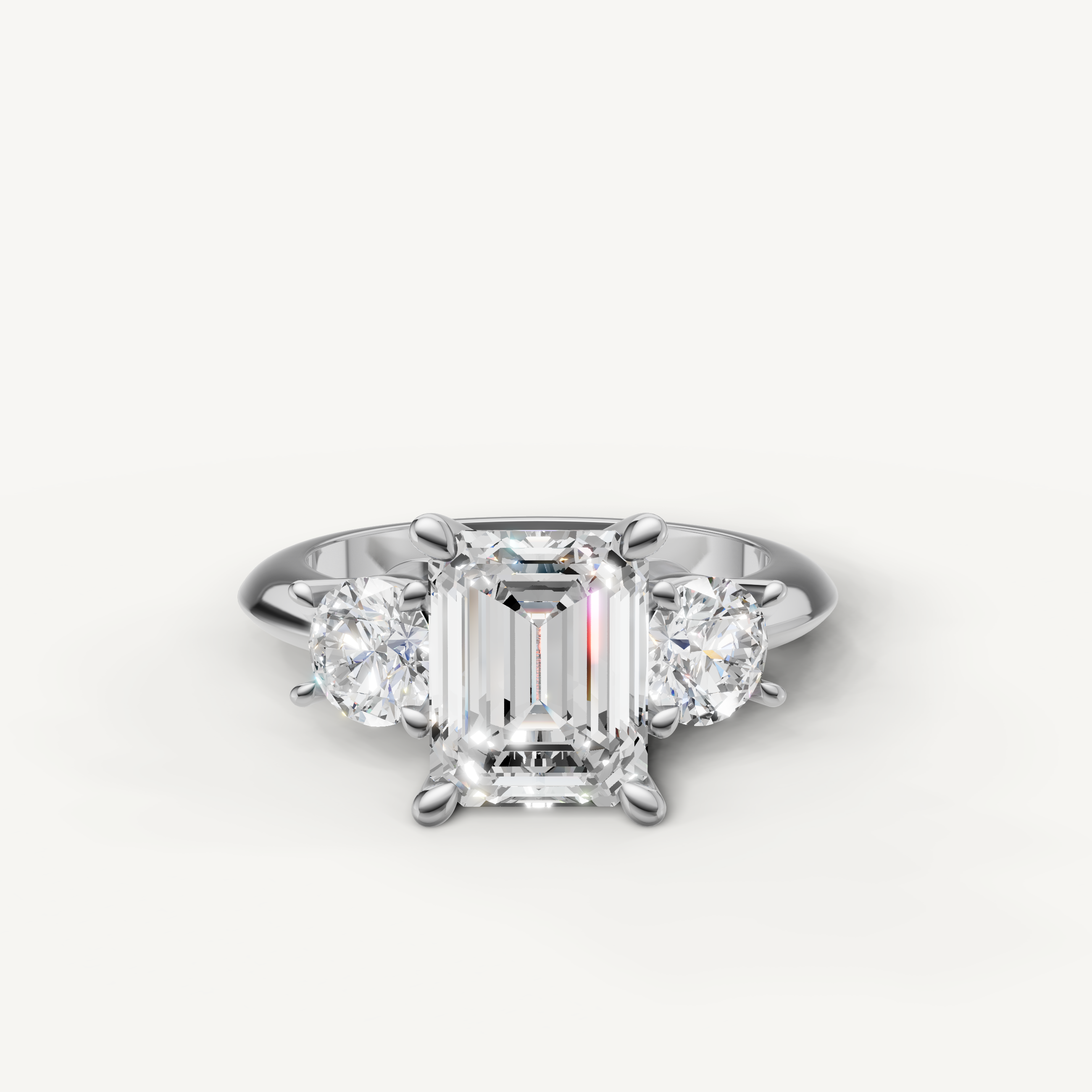 Emerald cut three stone lab grown diamond engagement ring in 14K white gold