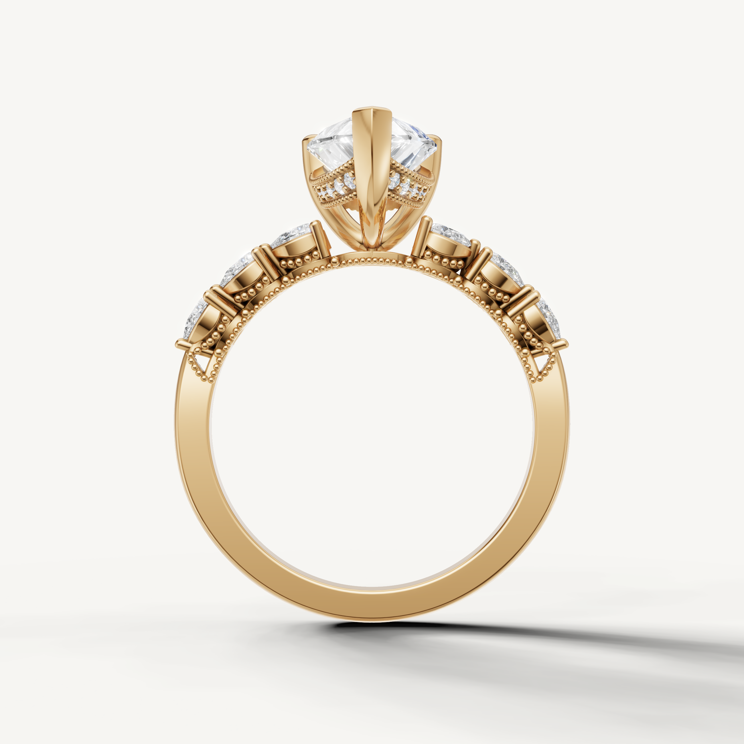 Pear shaped lab grown diamond solitaire ring in yellow gold with marquise accent diamonds by Raul Diamonds