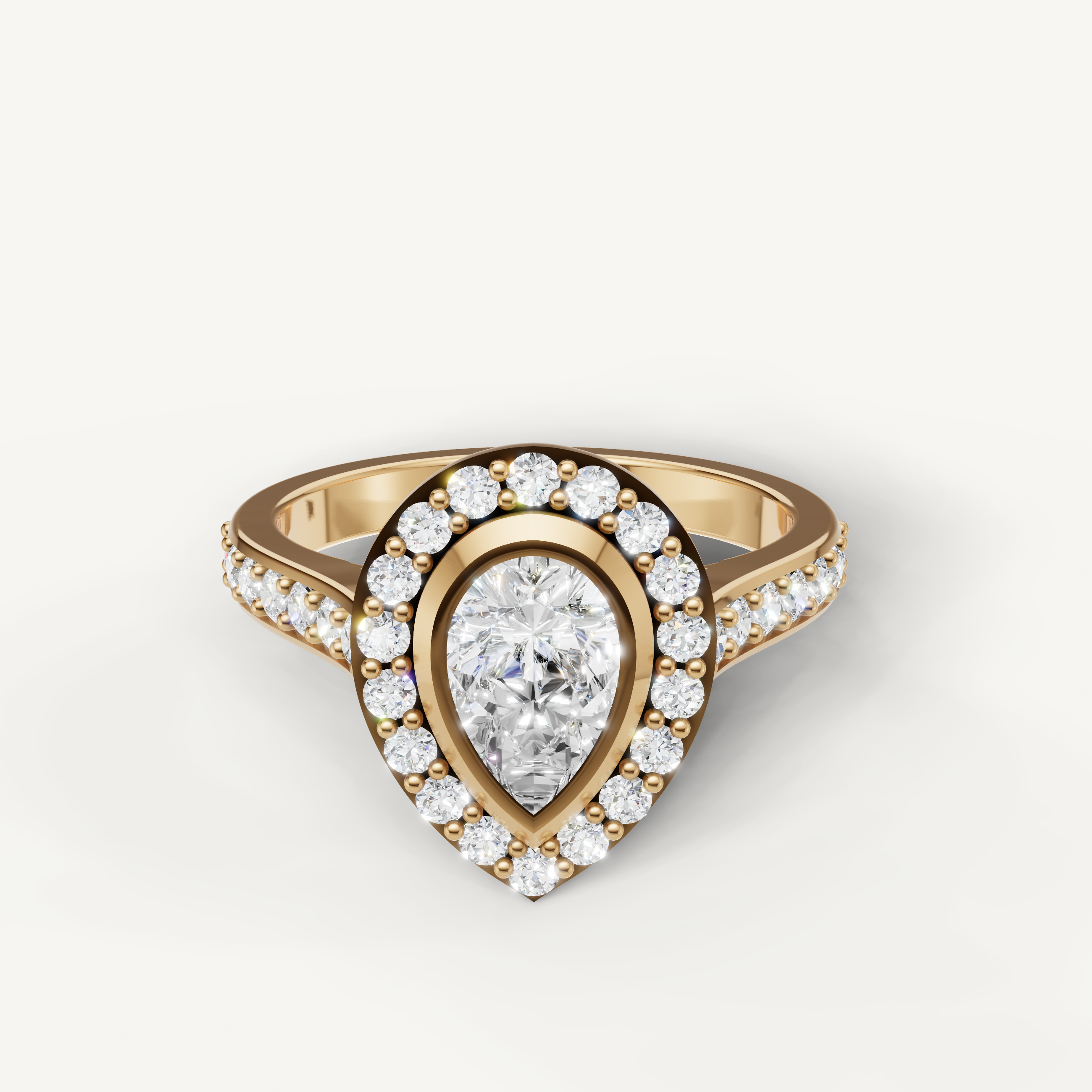 Raul Diamonds pear halo diamond engagement ring in yellow gold