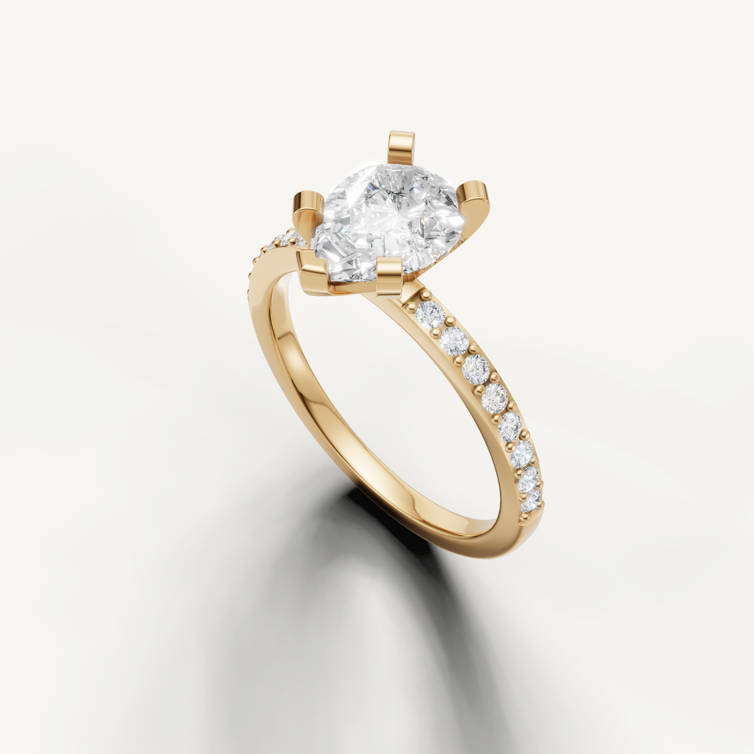 yellow gold pear shaped engagement ring with ethical lab grown diamond