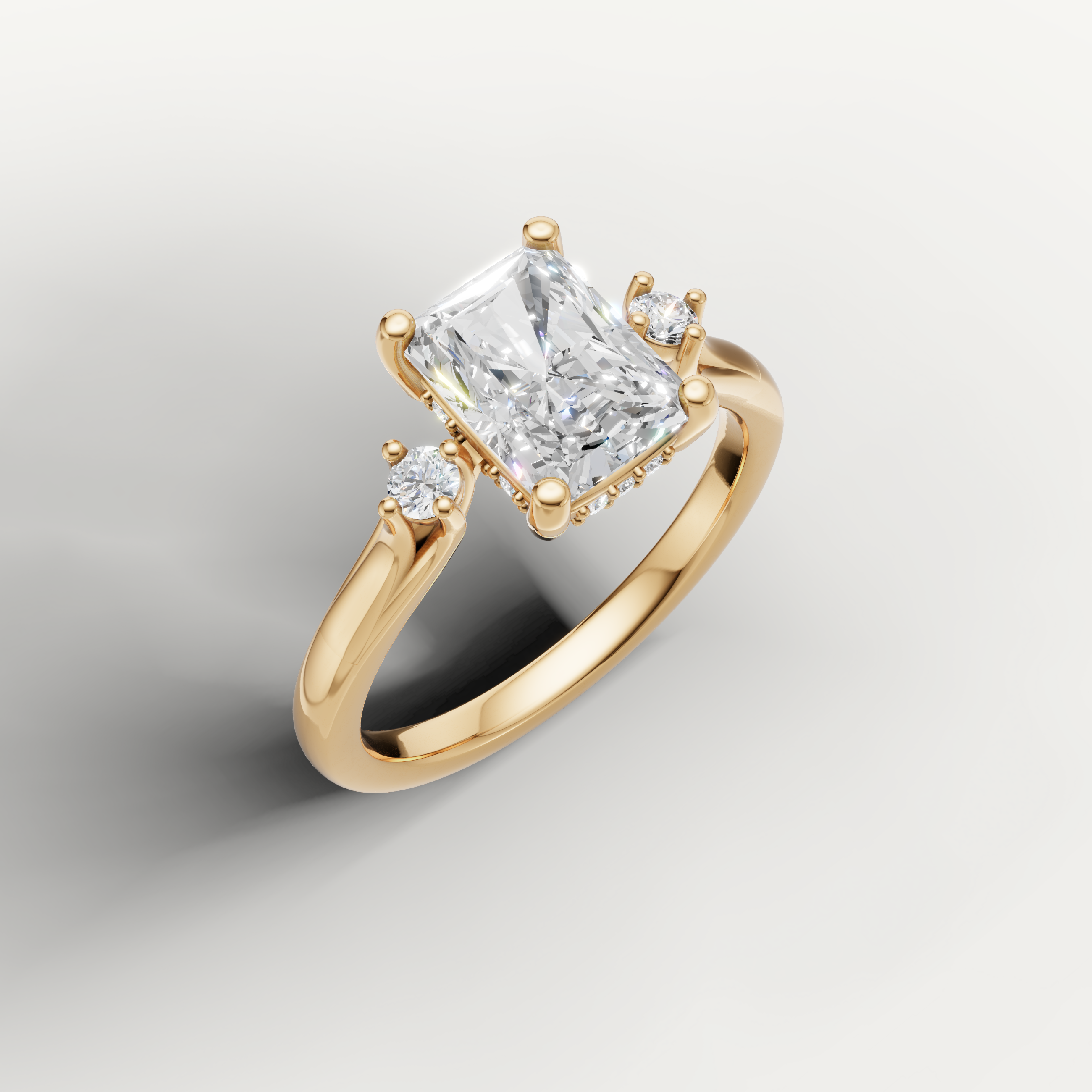 Elegant yellow gold radiant cut diamond ring with brilliant crushed ice sparkle and modern silhouette