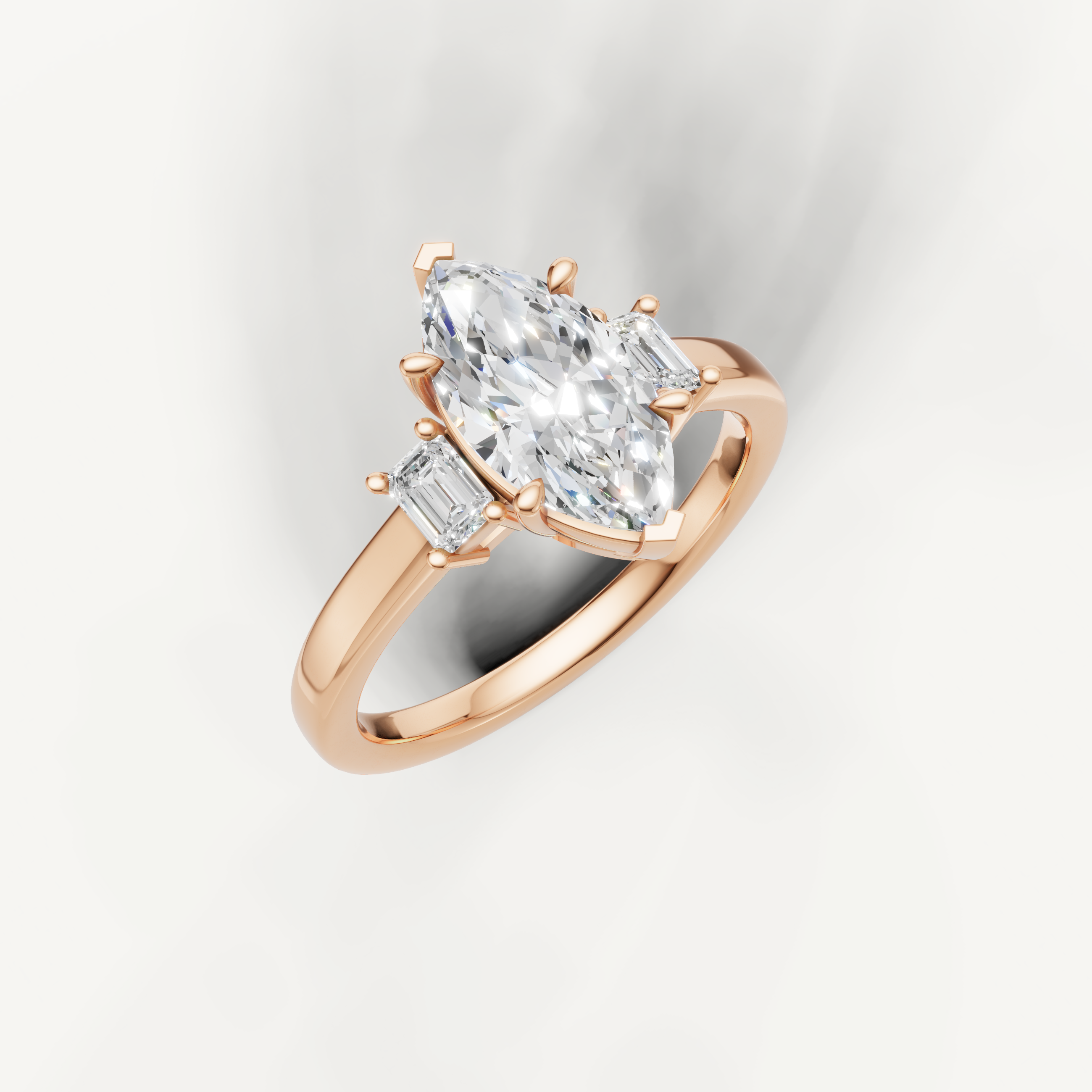 14K rose gold marquise lab grown diamond ring with tapered baguette side diamonds and polished band