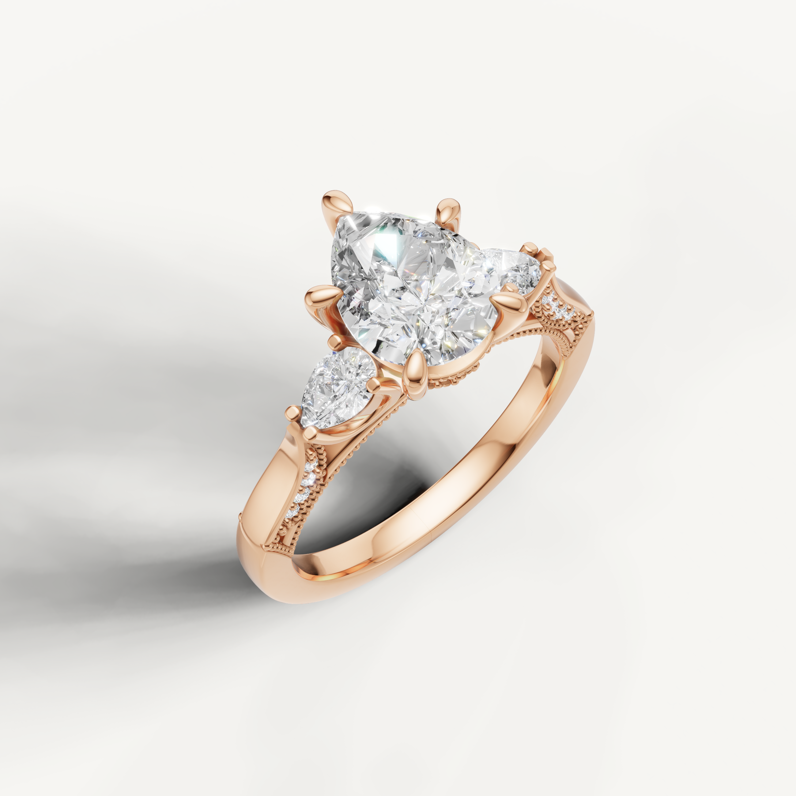 IGI certified pear lab diamond ring with matching pear accents rose gold