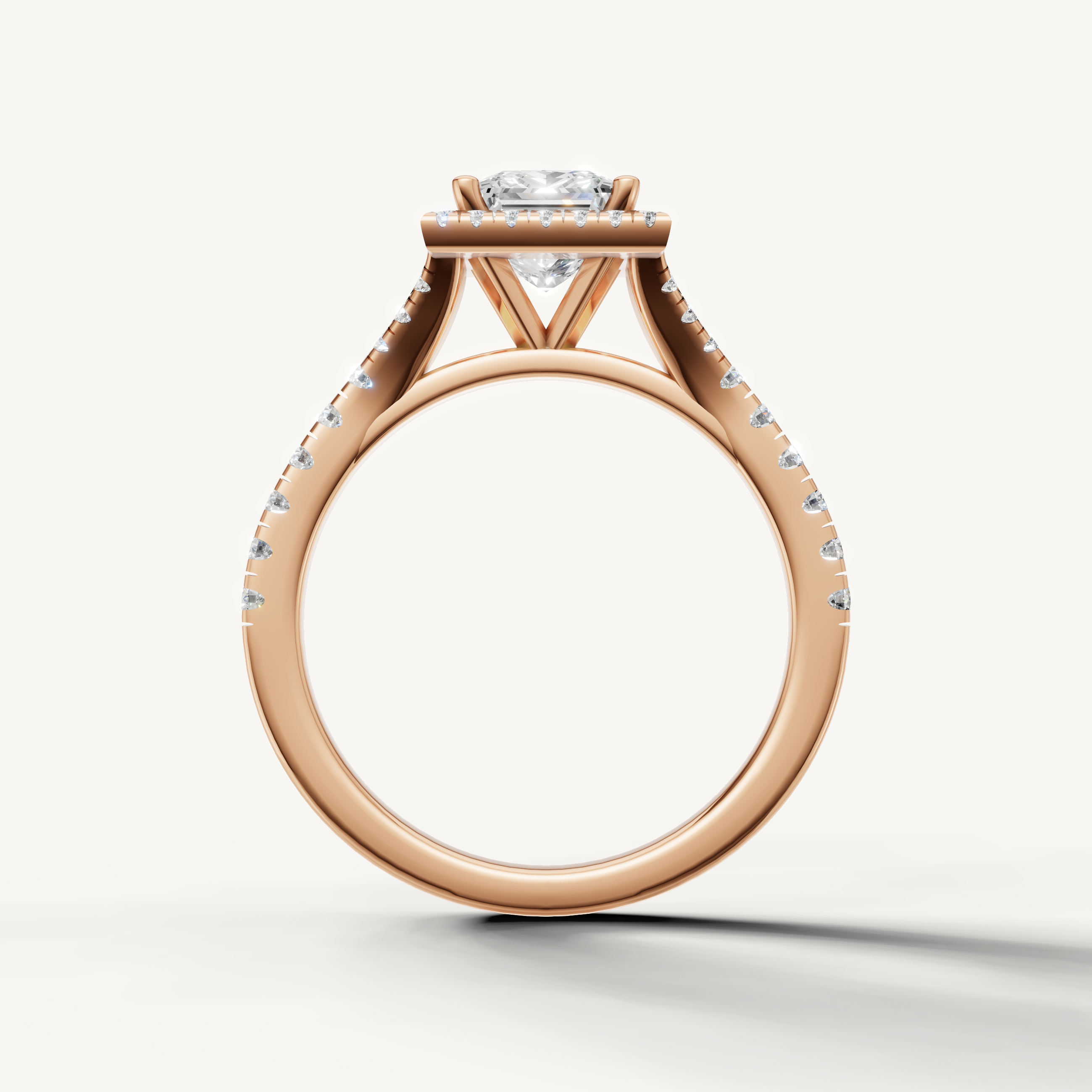 Princess cut engagement ring with halo and pavé band rose gold