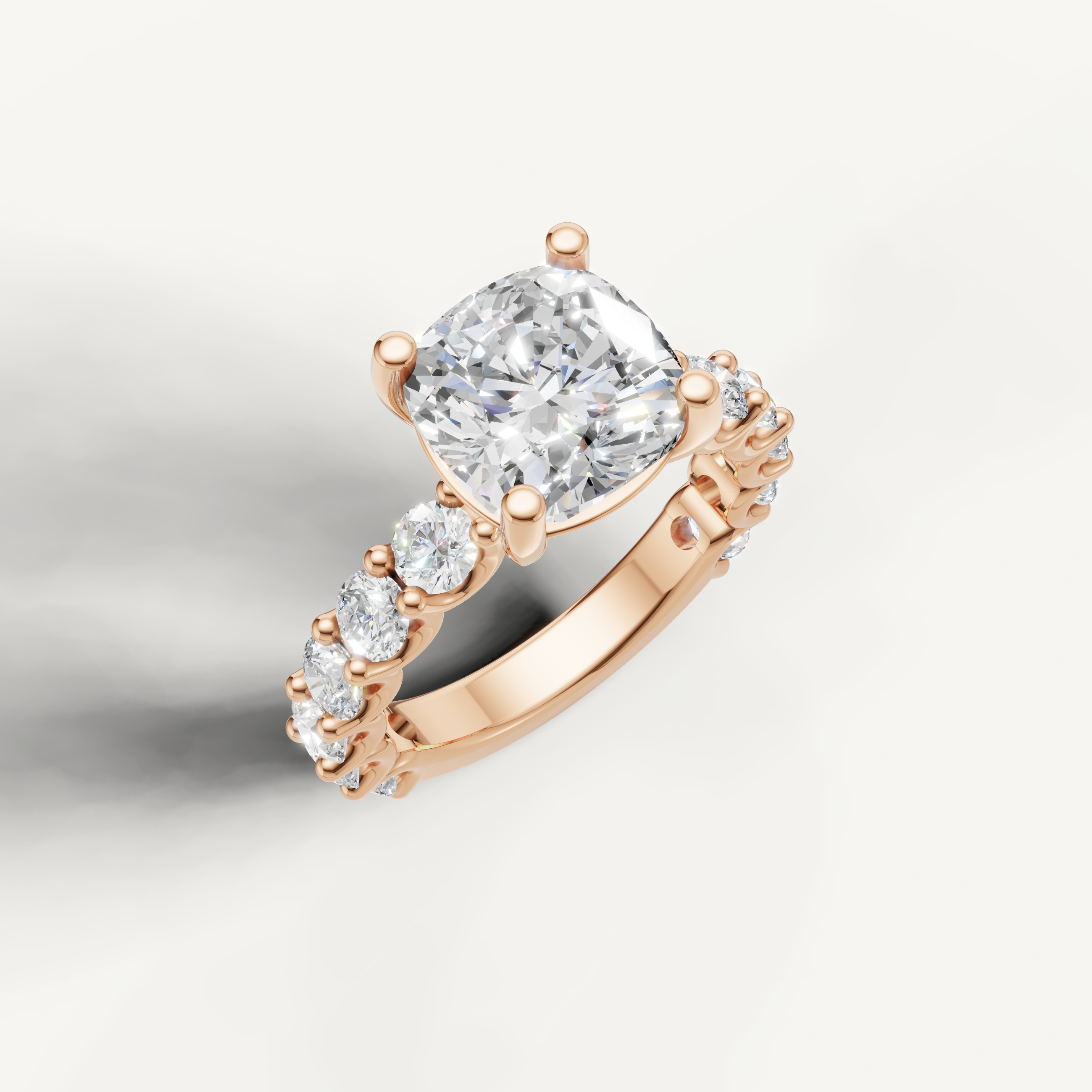 IGI certified cushion lab diamond solitaire ring with scalloped shared prong band rose gold
