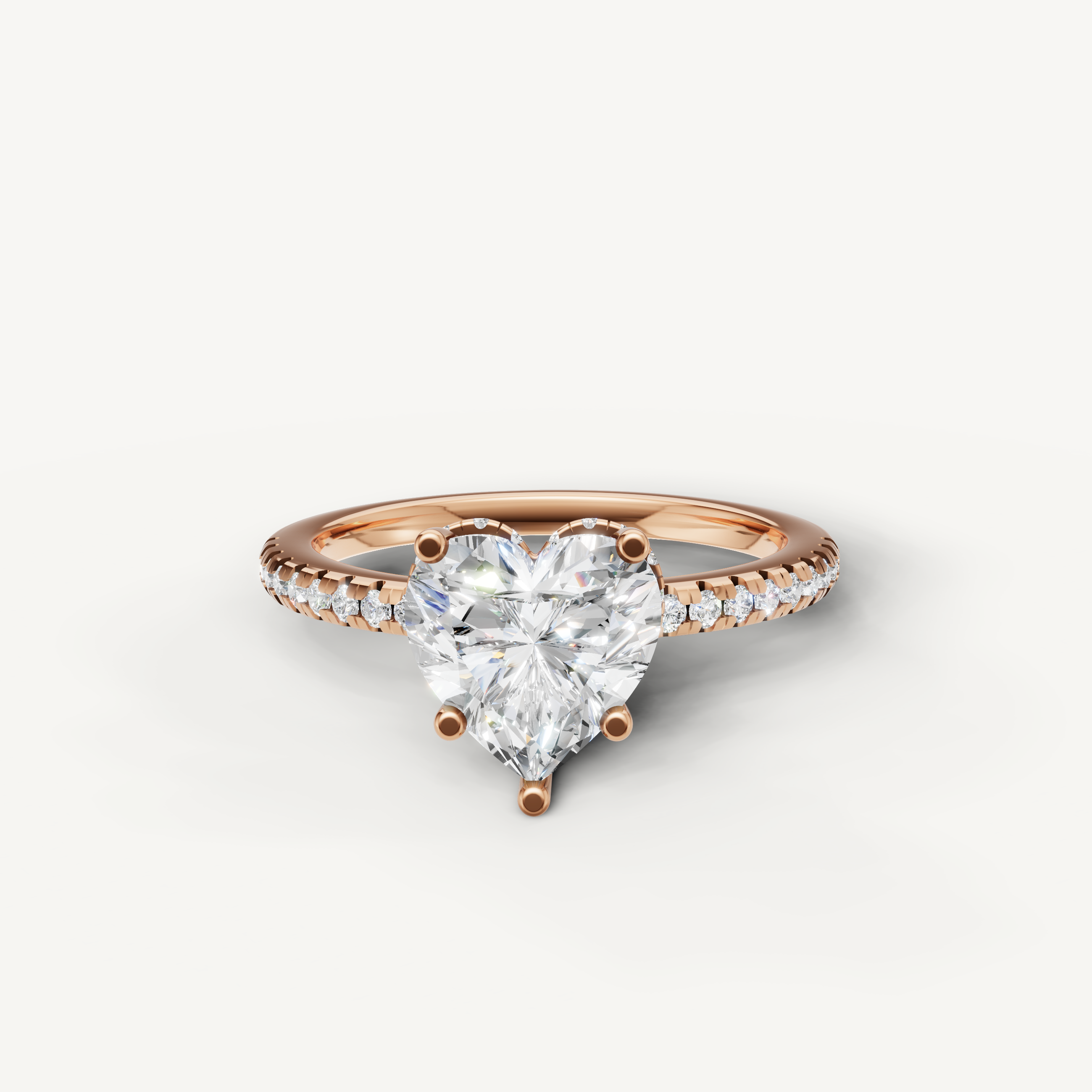 heart shaped lab grown diamond engagement ring with pavé band in 14k rose gold