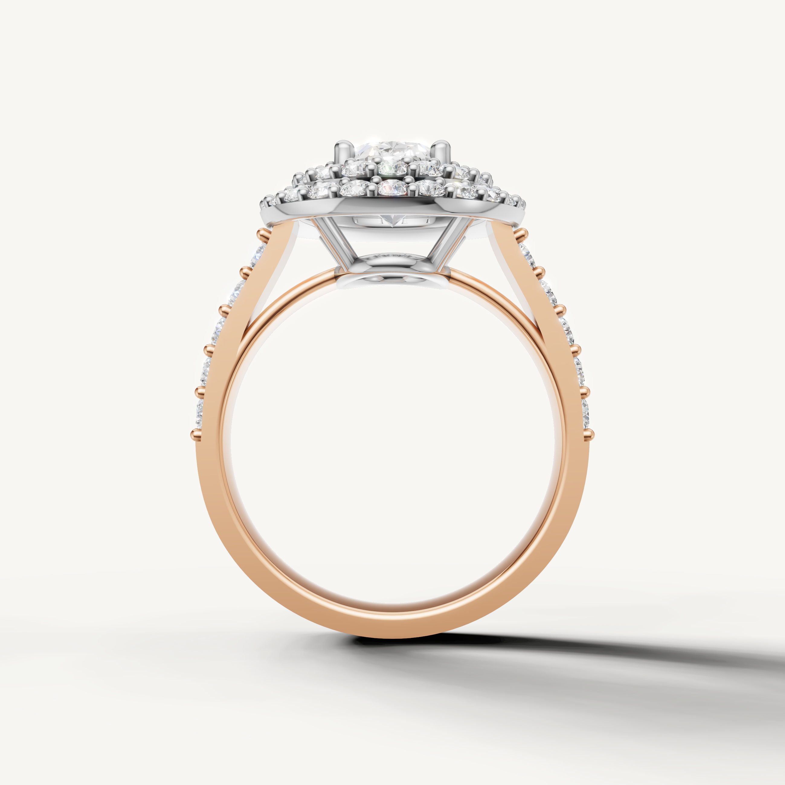 White gold oval diamond halo engagement ring with luxury pavé setting