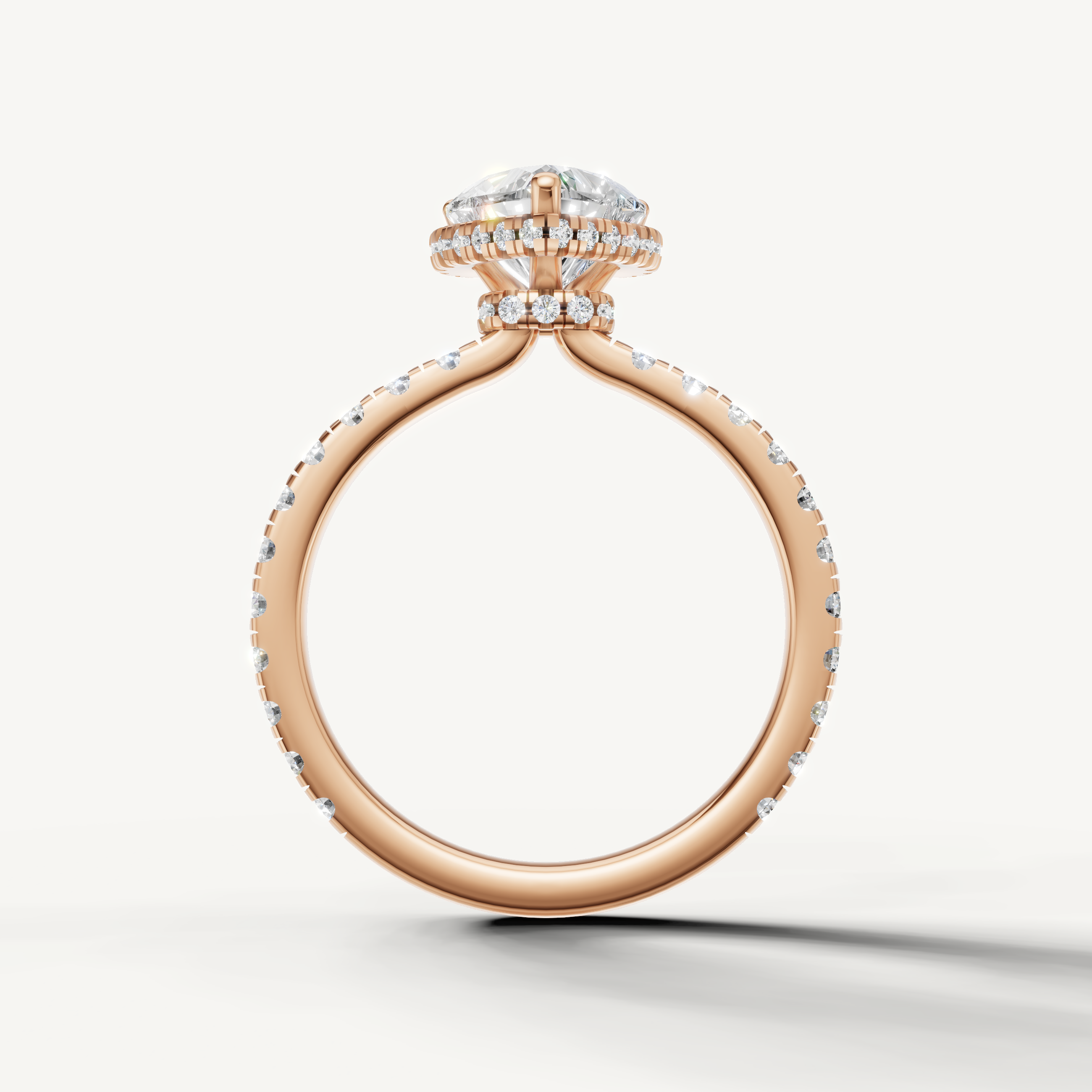 feminine heart shaped diamond engagement ring with shimmering pavé diamonds