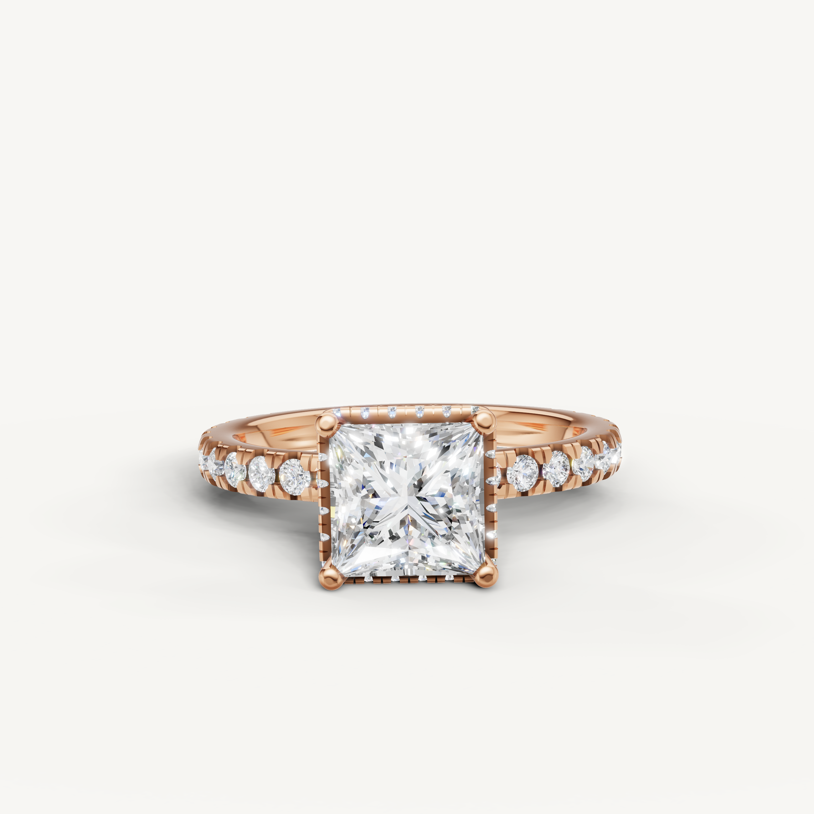 princess cut lab grown diamond hidden halo engagement ring in 14k rose gold with sparkling pavé diamond band