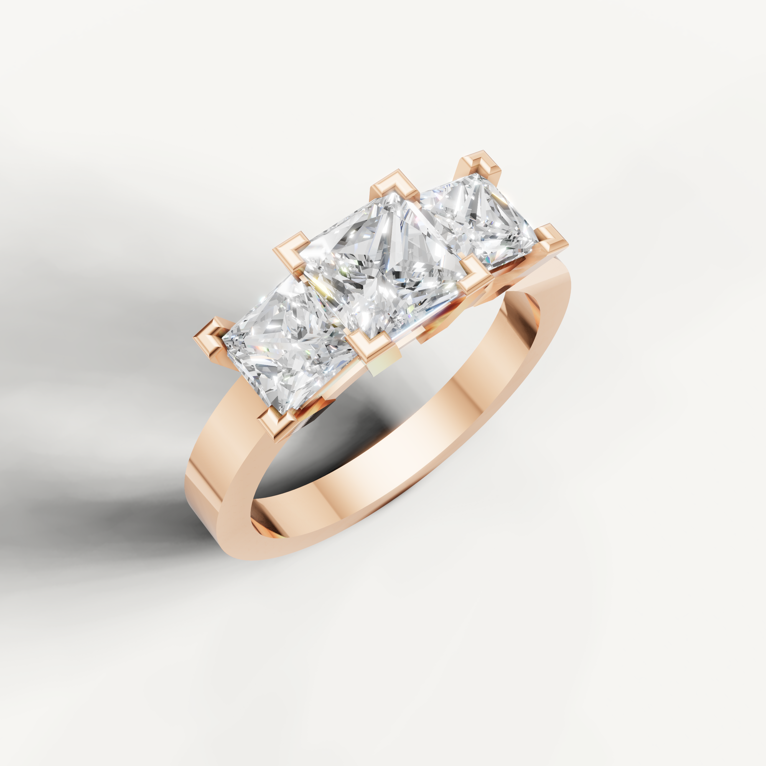 Three stone princess cut diamond ring in rose gold by Raul Diamonds