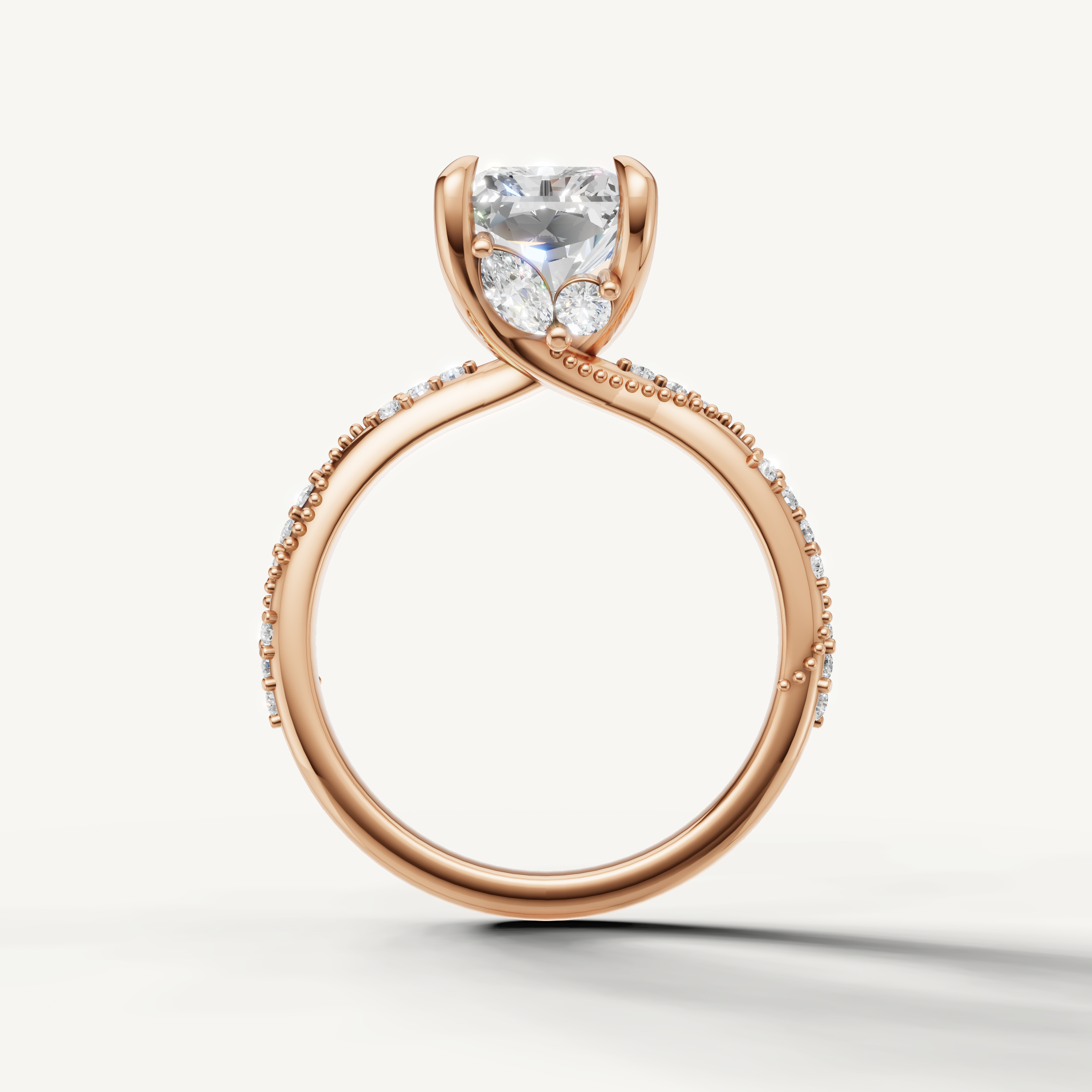 radiant diamond engagement ring with elegant crossover pavé band rose gold