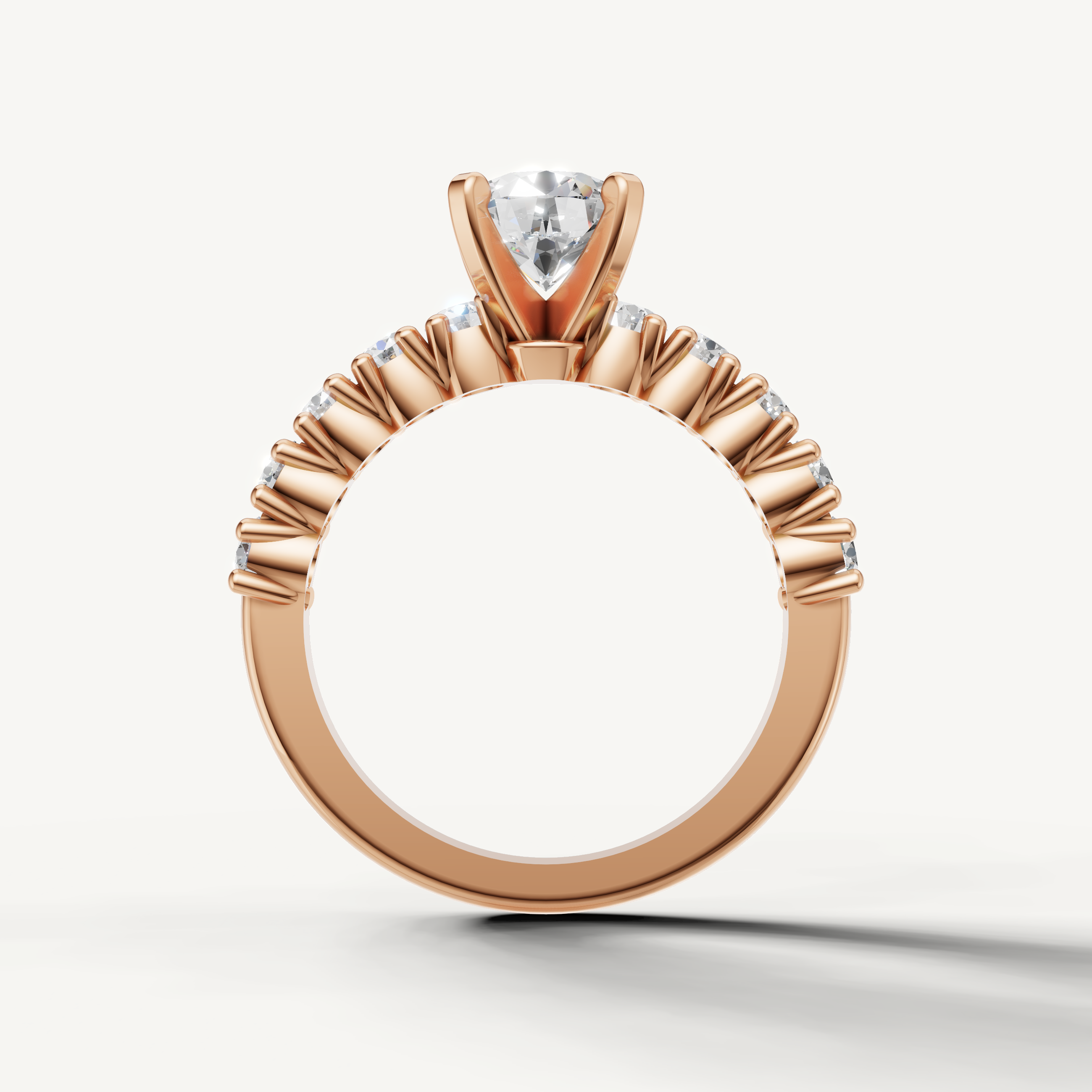 White gold round diamond engagement ring with classic side stone design by Raul Diamonds