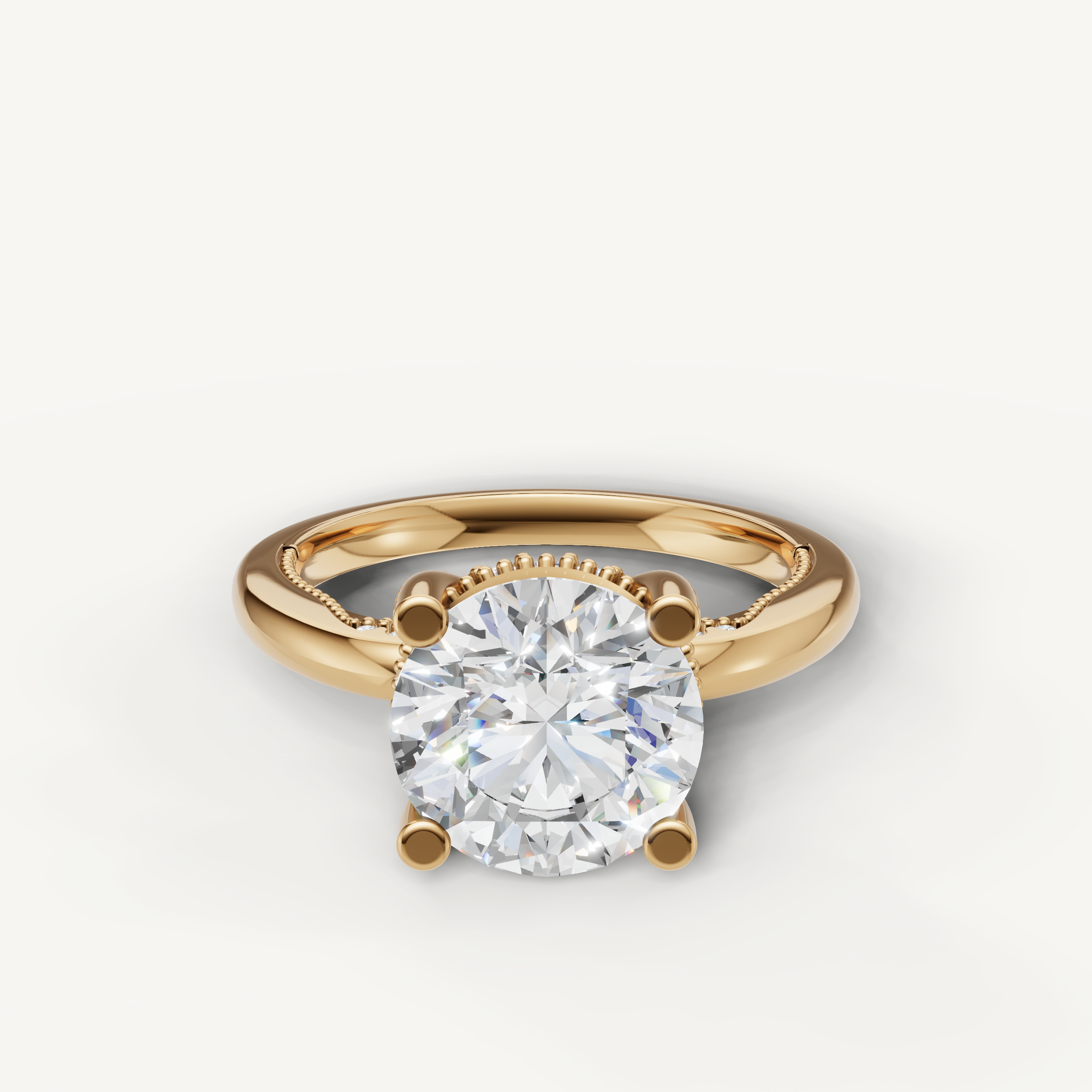 A classic solitaire engagement ring in polished 14k yellow gold, featuring a brilliant, perfectly round-cut diamond in a secure four-prong setting.