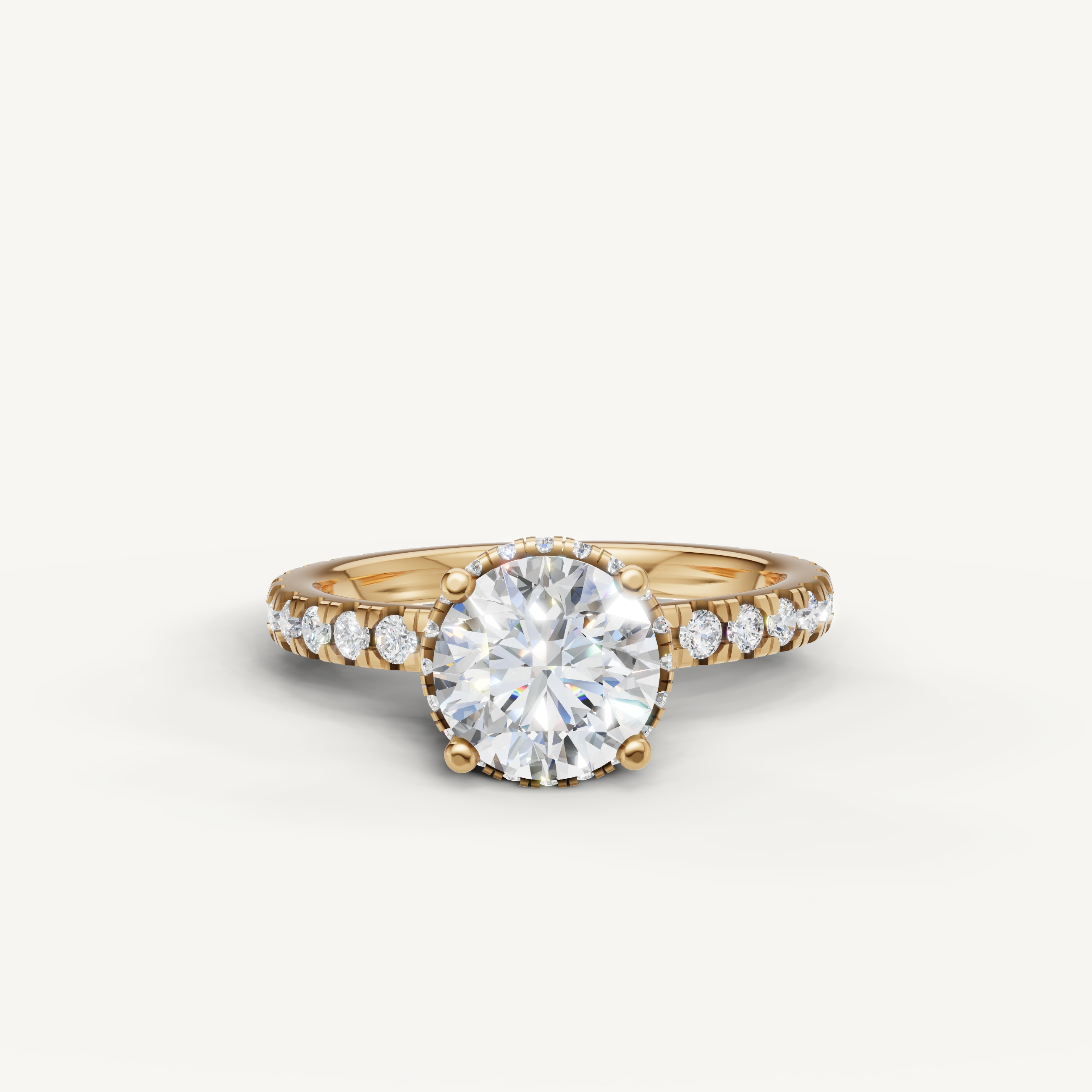 round brilliant cut lab grown diamond hidden halo engagement ring in 14k yellow gold with pavé diamond band