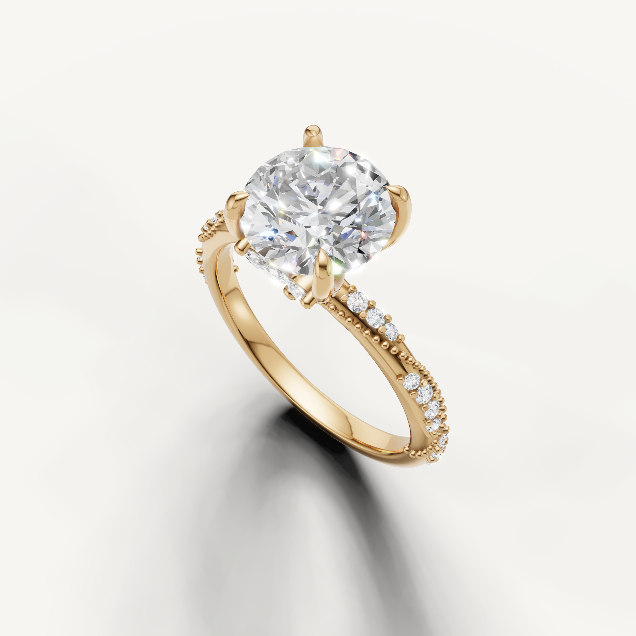 round cut lab grown diamond ring with delicate twisted pavé setting yellow gold