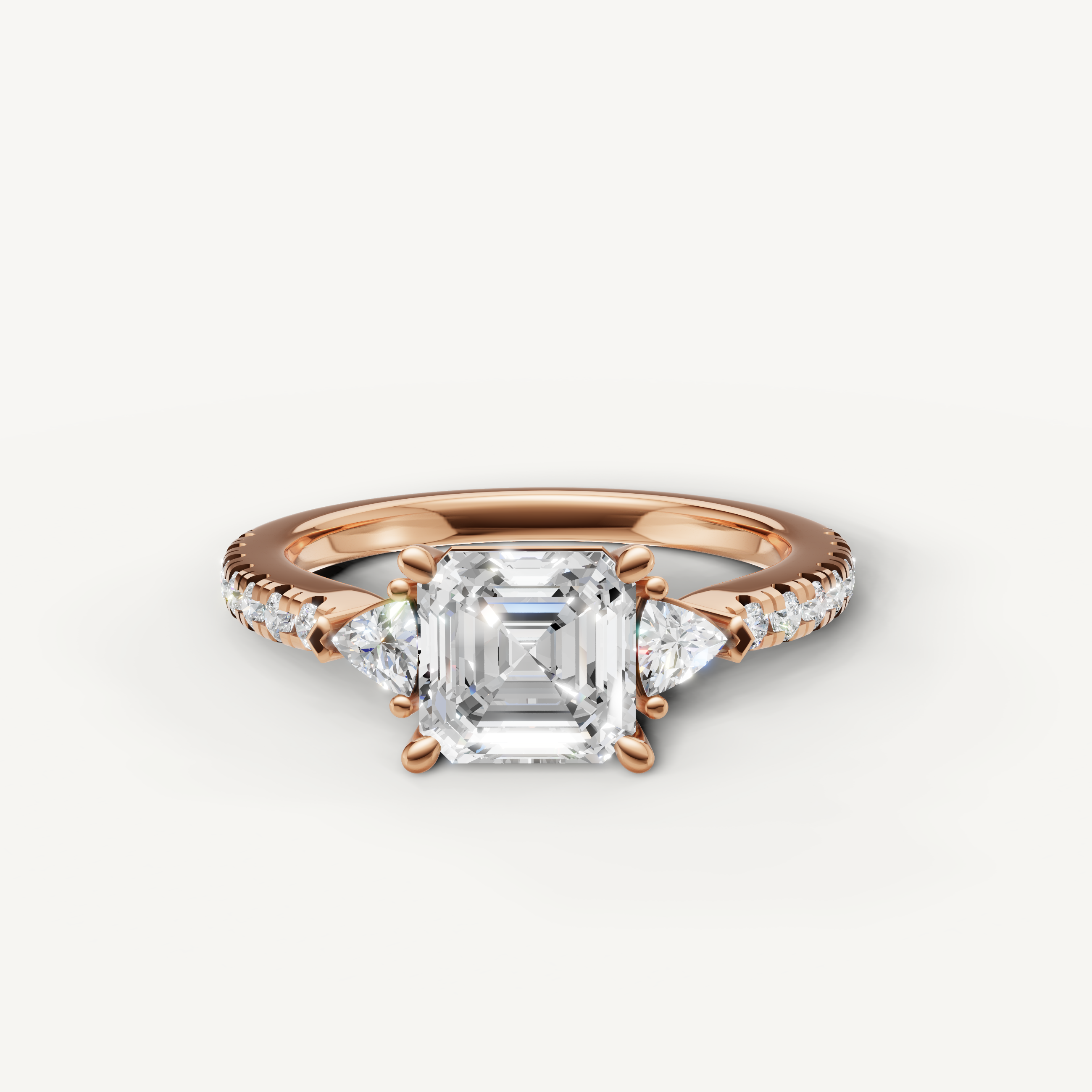 Asscher cut lab grown diamond engagement ring in 14K rose gold with pavé setting and side stones