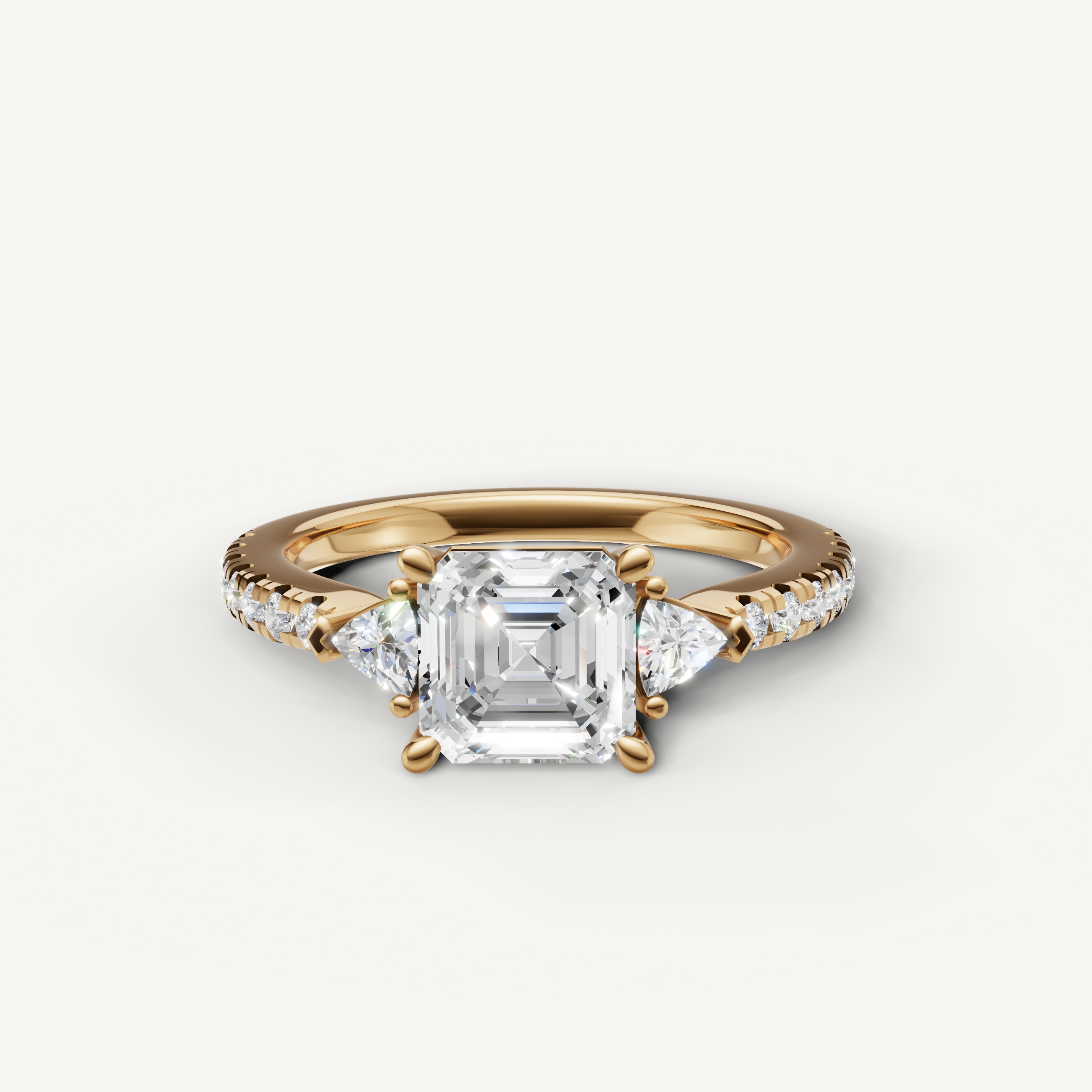 Asscher cut lab grown diamond engagement ring in 14K rose gold with pavé band and tapered side stones