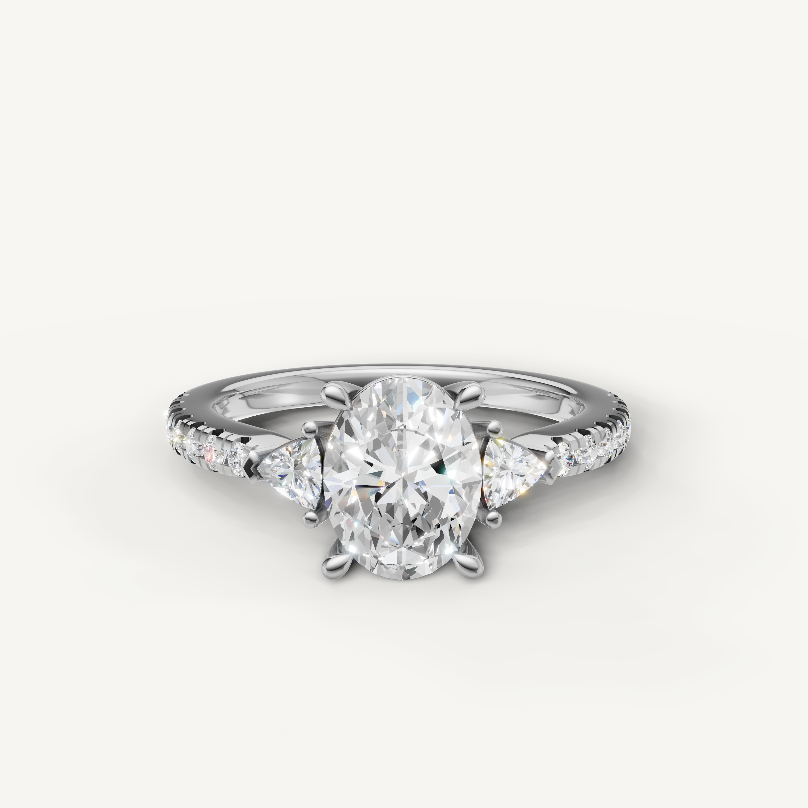 Oval cut lab grown diamond engagement ring in 14K white gold with pavé band and side stones