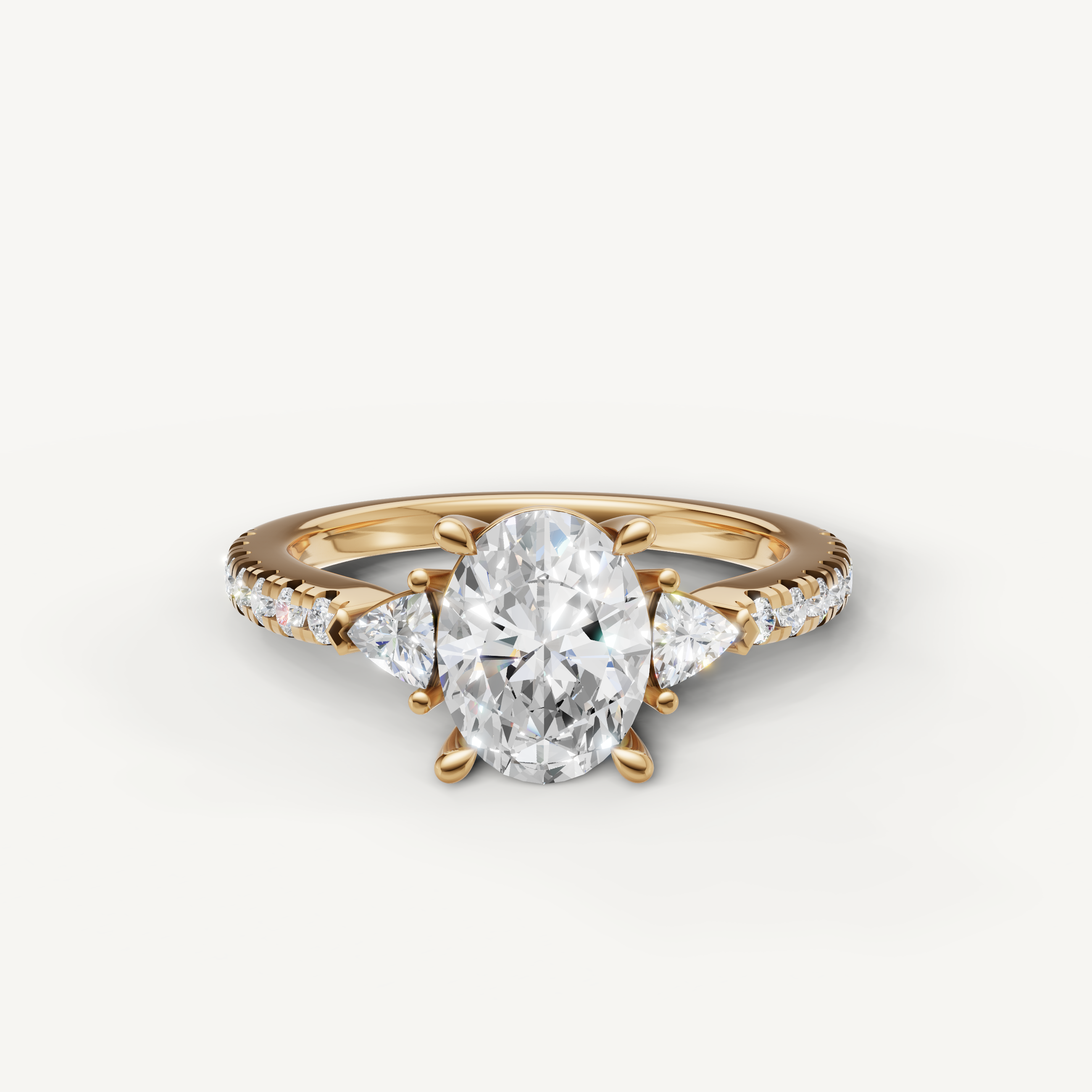 14K yellow gold oval cut lab grown diamond ring with tapered side diamonds and pavé setting