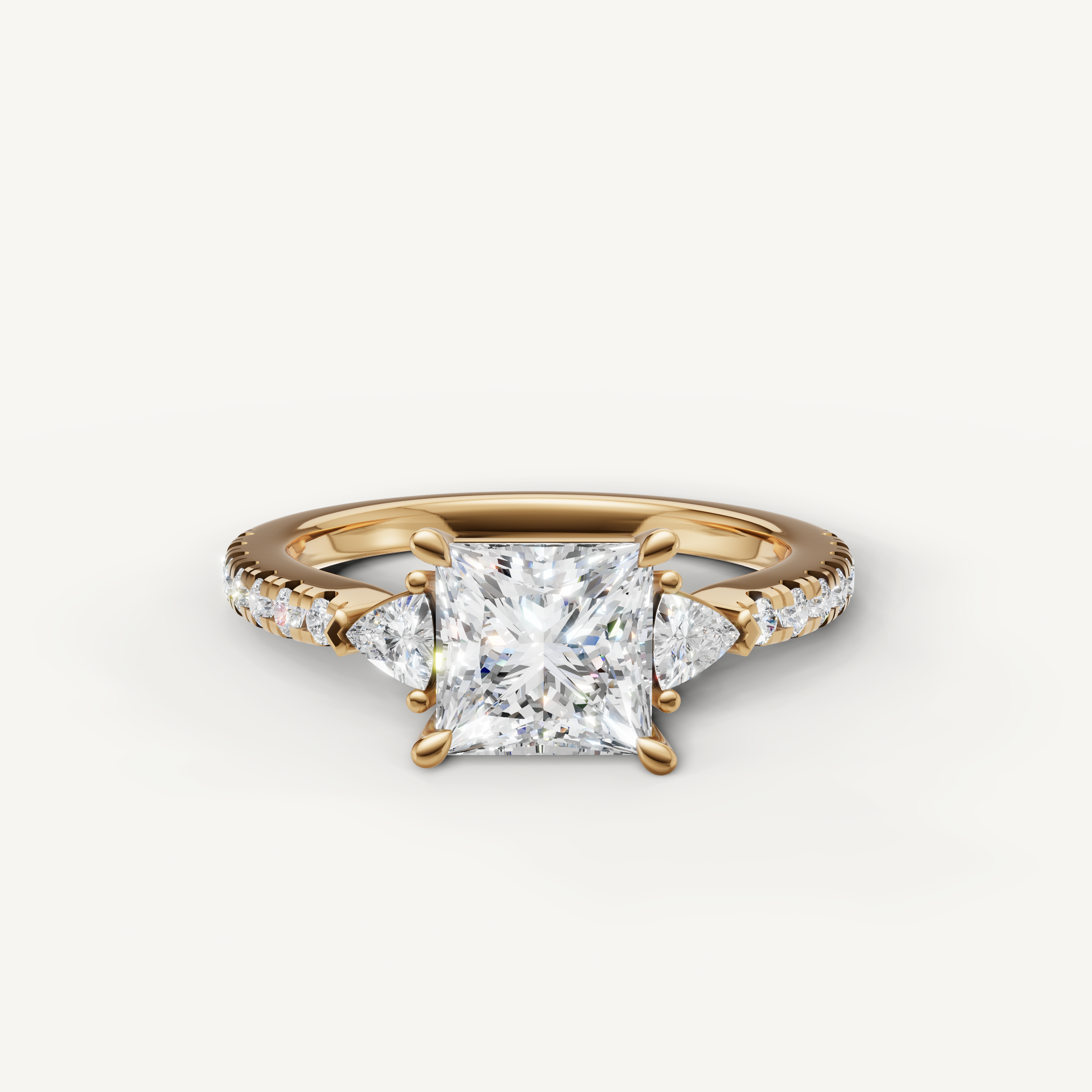 Princess cut lab grown diamond engagement ring in 14K yellow gold with pavé band and side stones