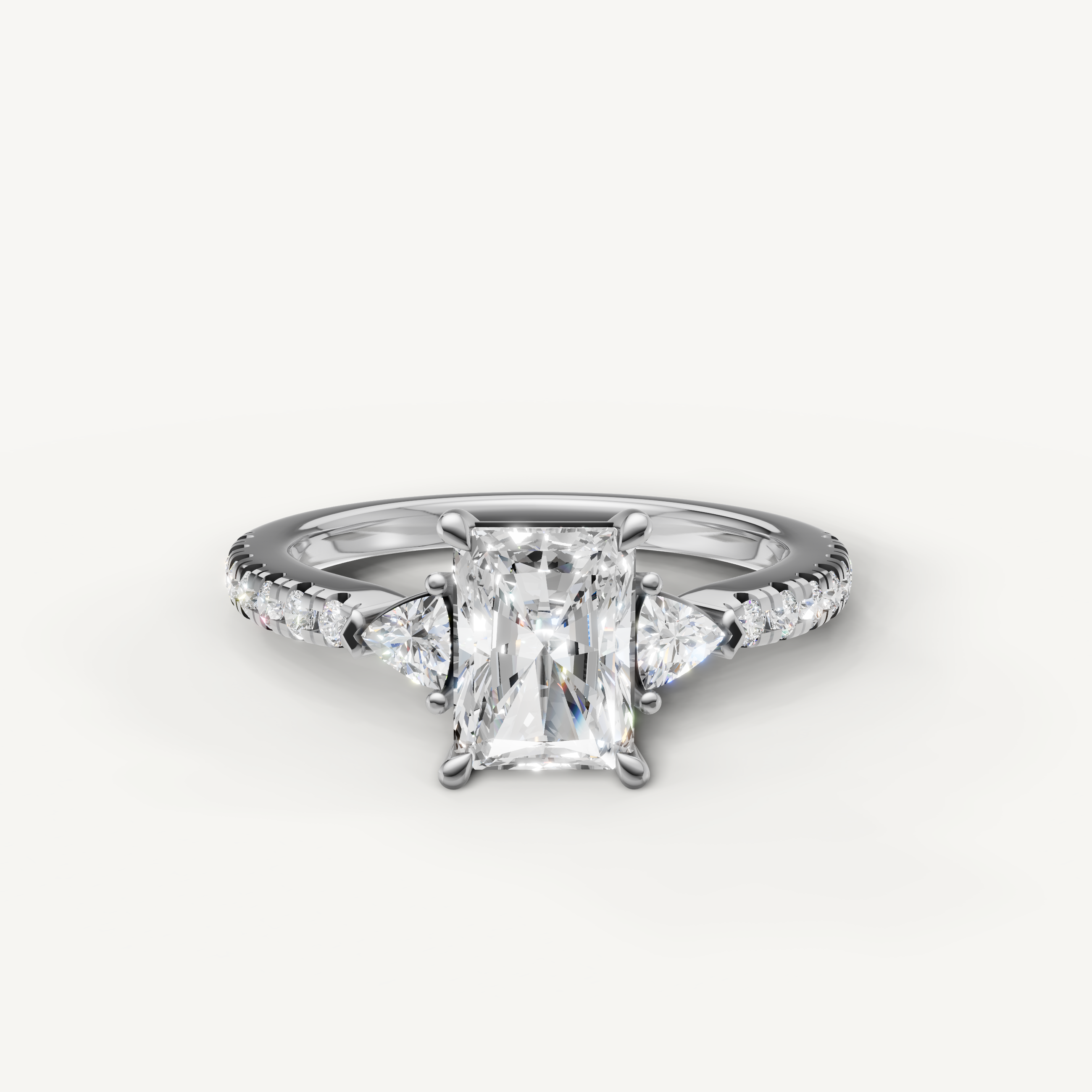 Radiant cut lab grown diamond engagement ring in 14K white gold with pavé band and side stones