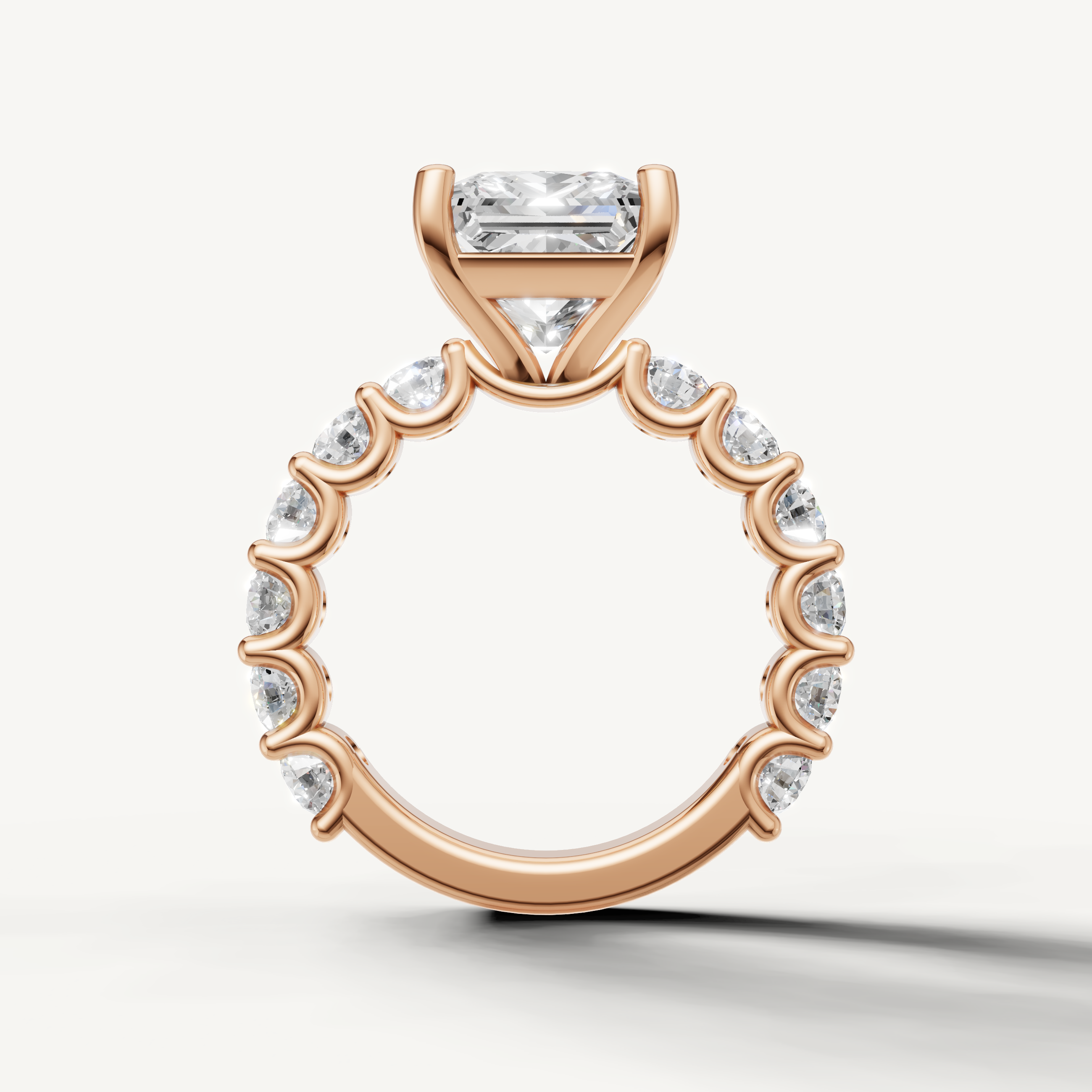 Elegant princess engagement ring with open gallery shared prong band rose gold